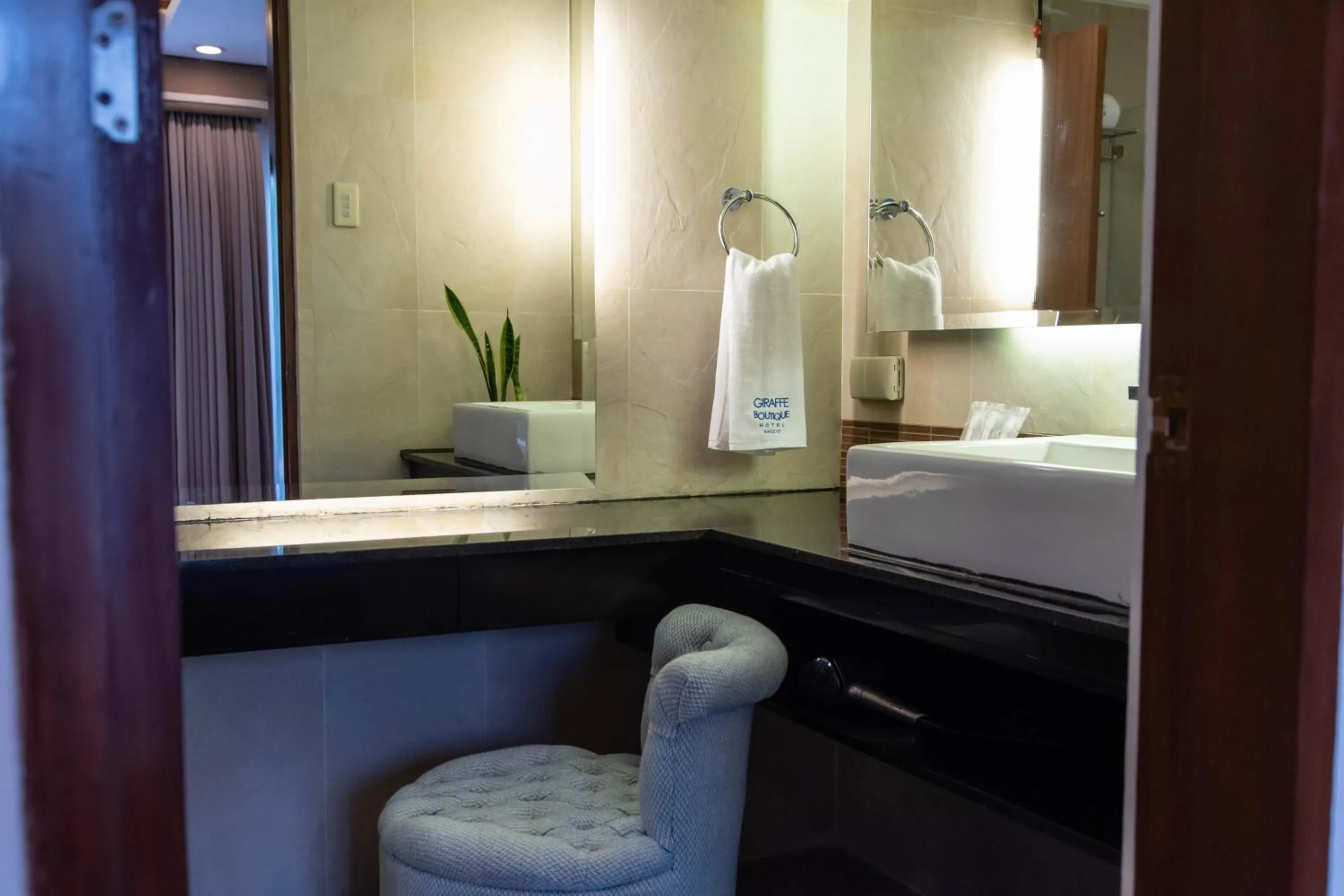 Bed in Giraffe Boutique Hotel