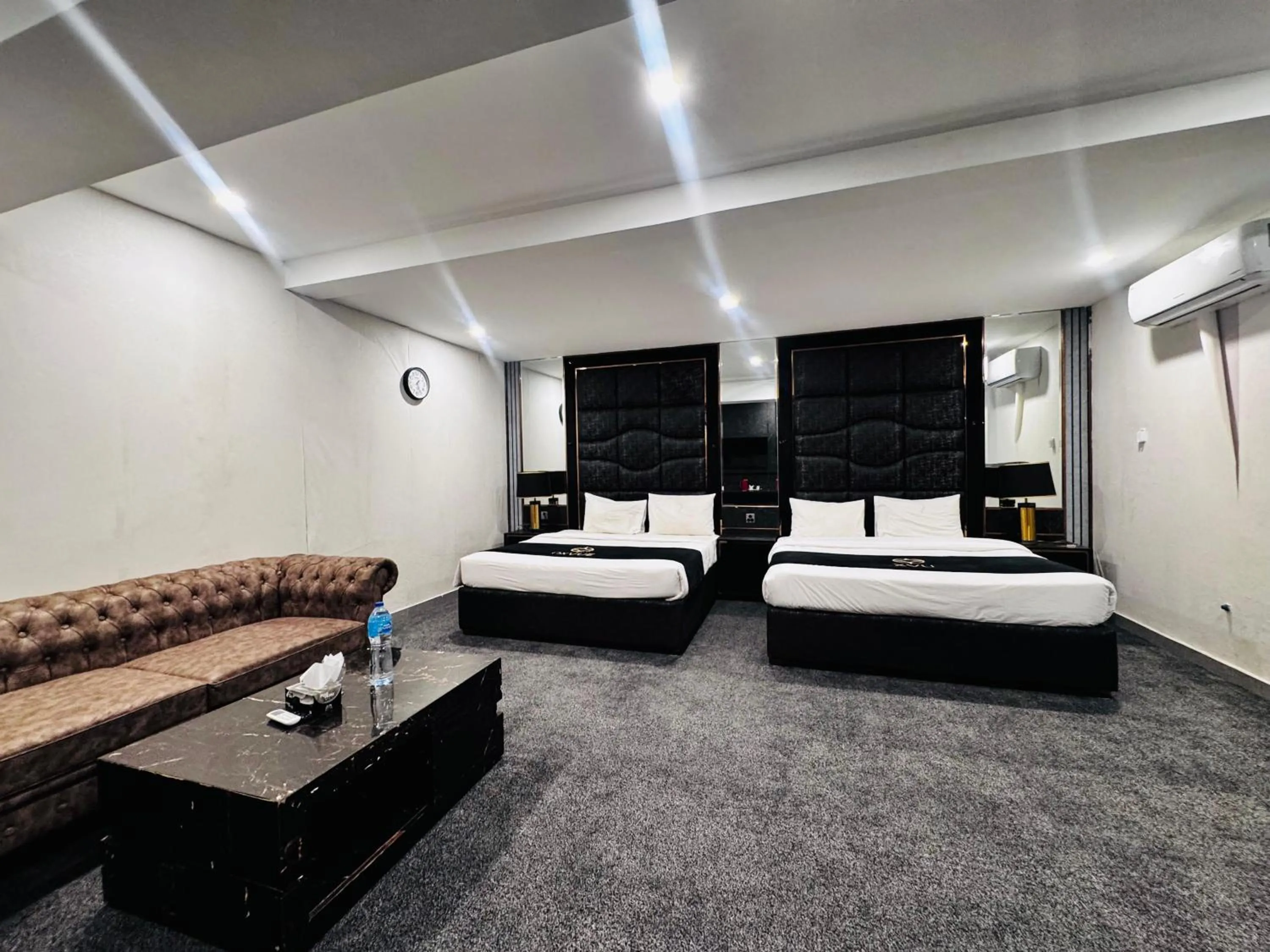 Bed in OXVUE Boutique Hotel