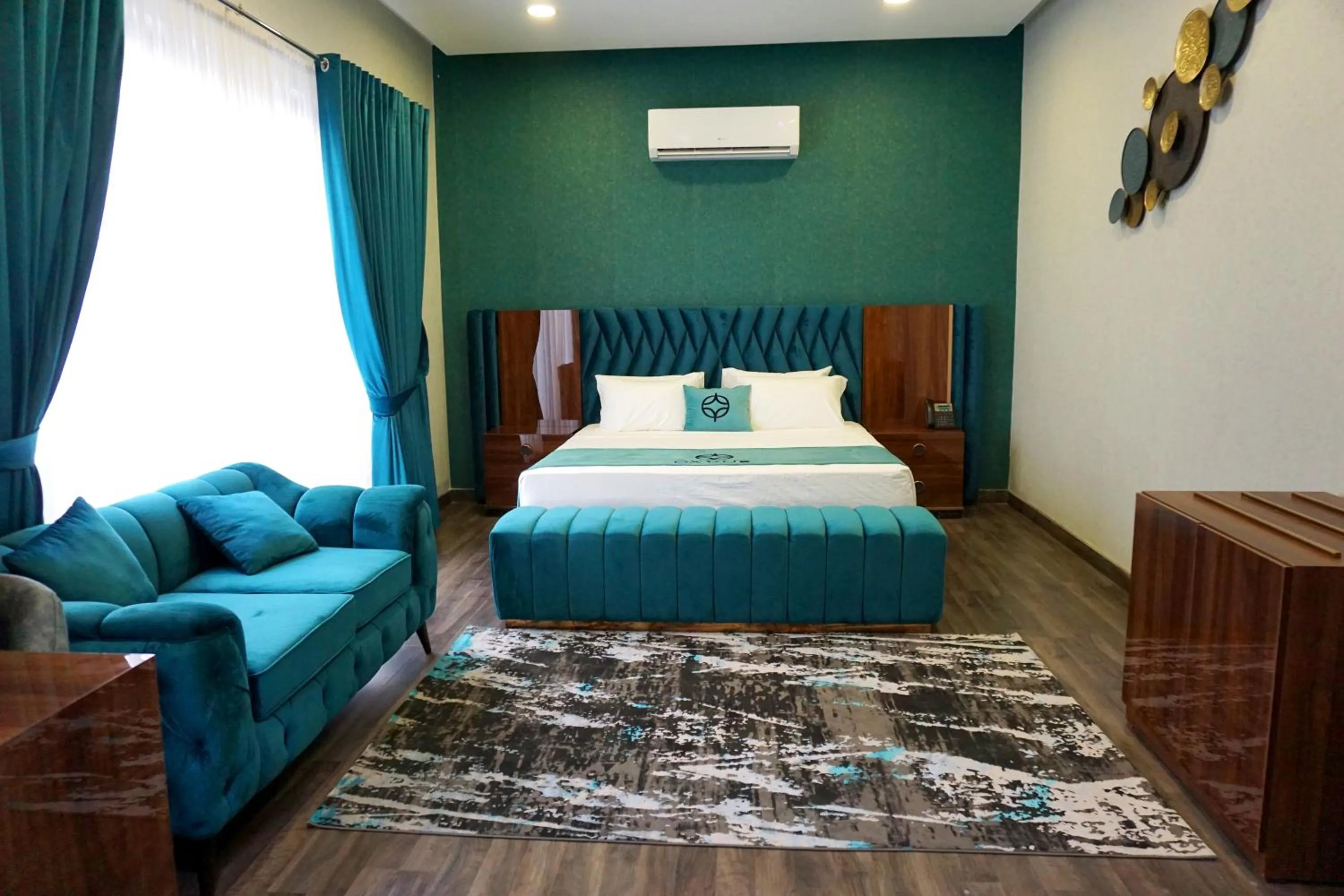 Bed in OXVUE Boutique Hotel