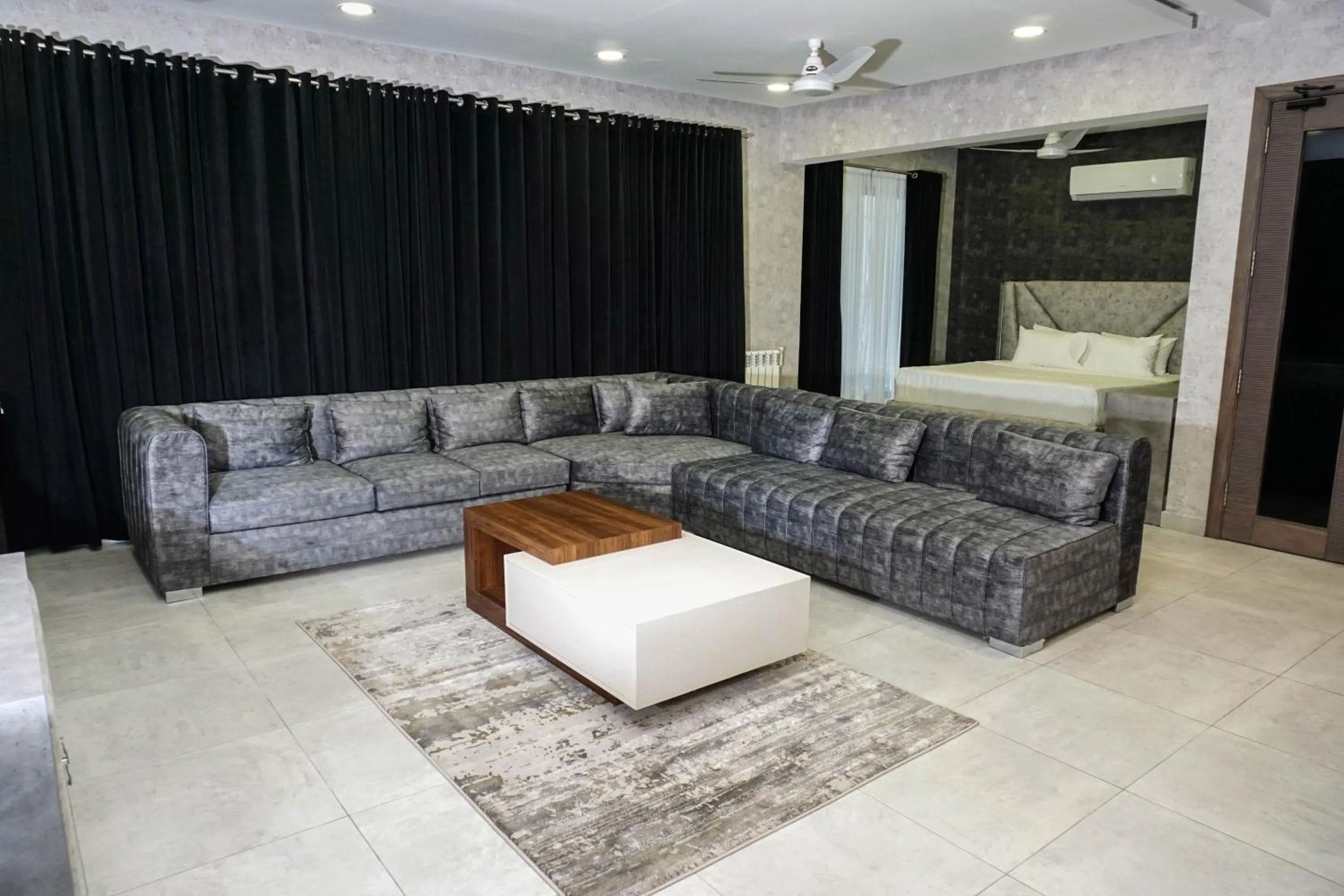 Living room, Bed in OXVUE Boutique Hotel