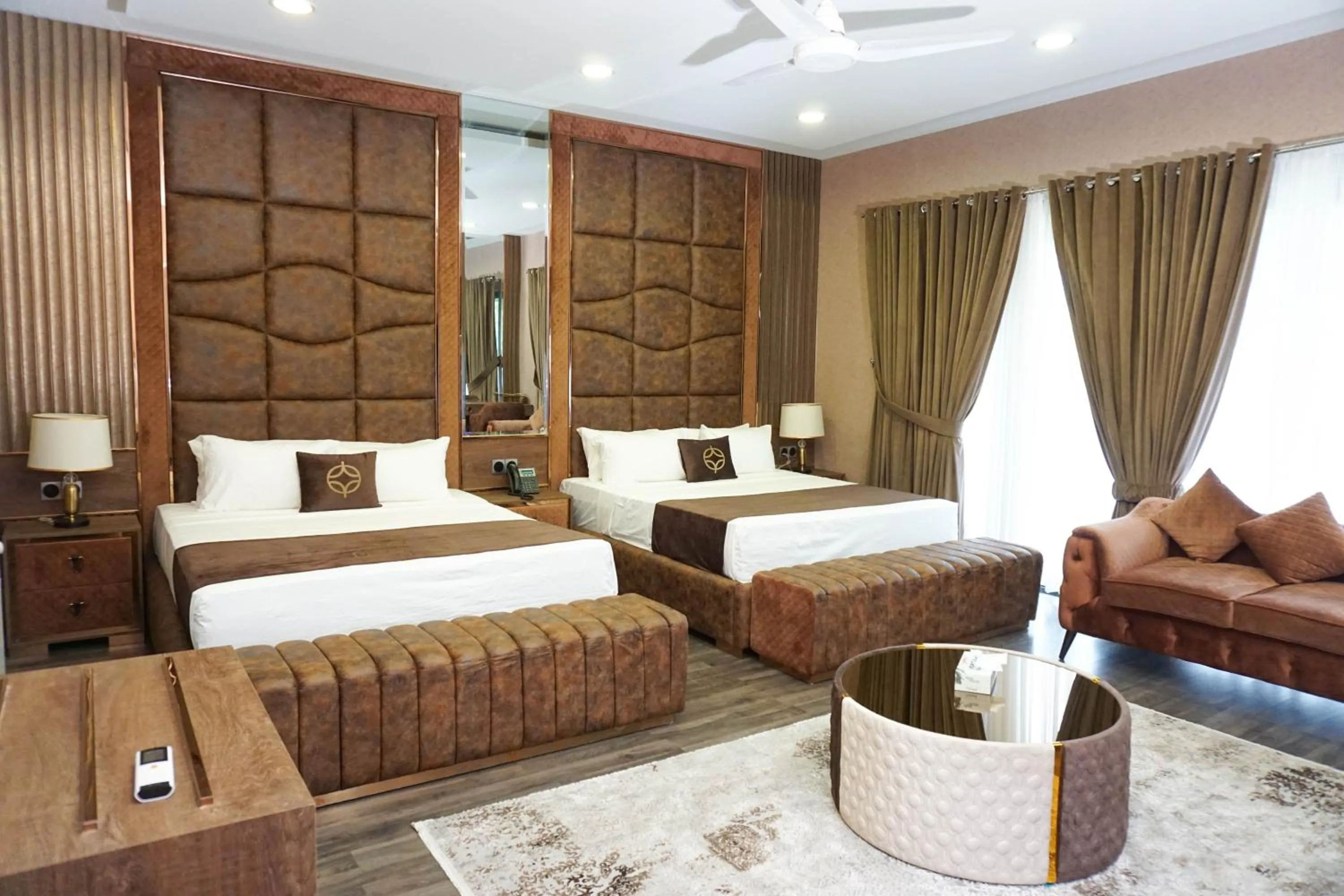 Bed in OXVUE Boutique Hotel