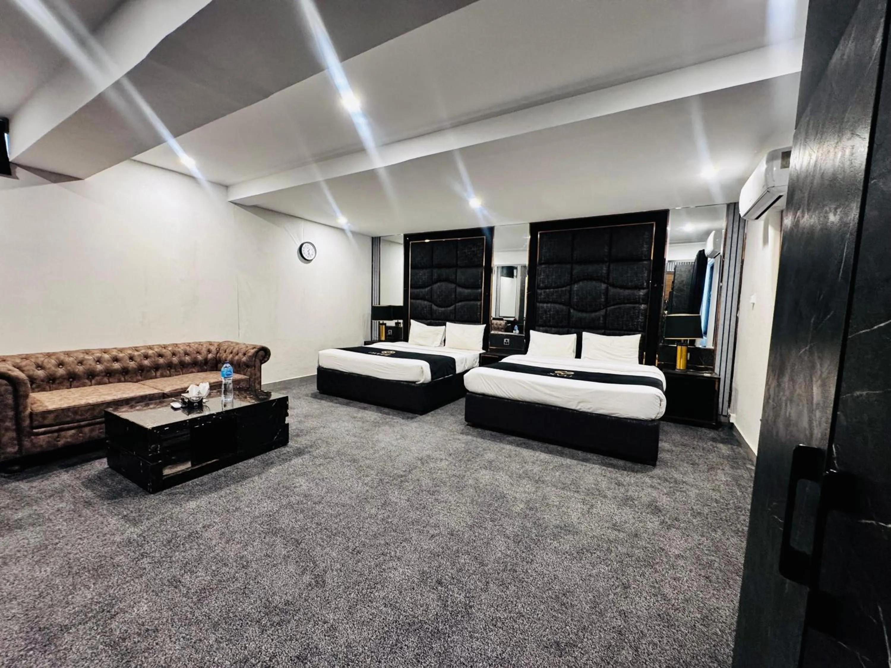 Bed in OXVUE Boutique Hotel