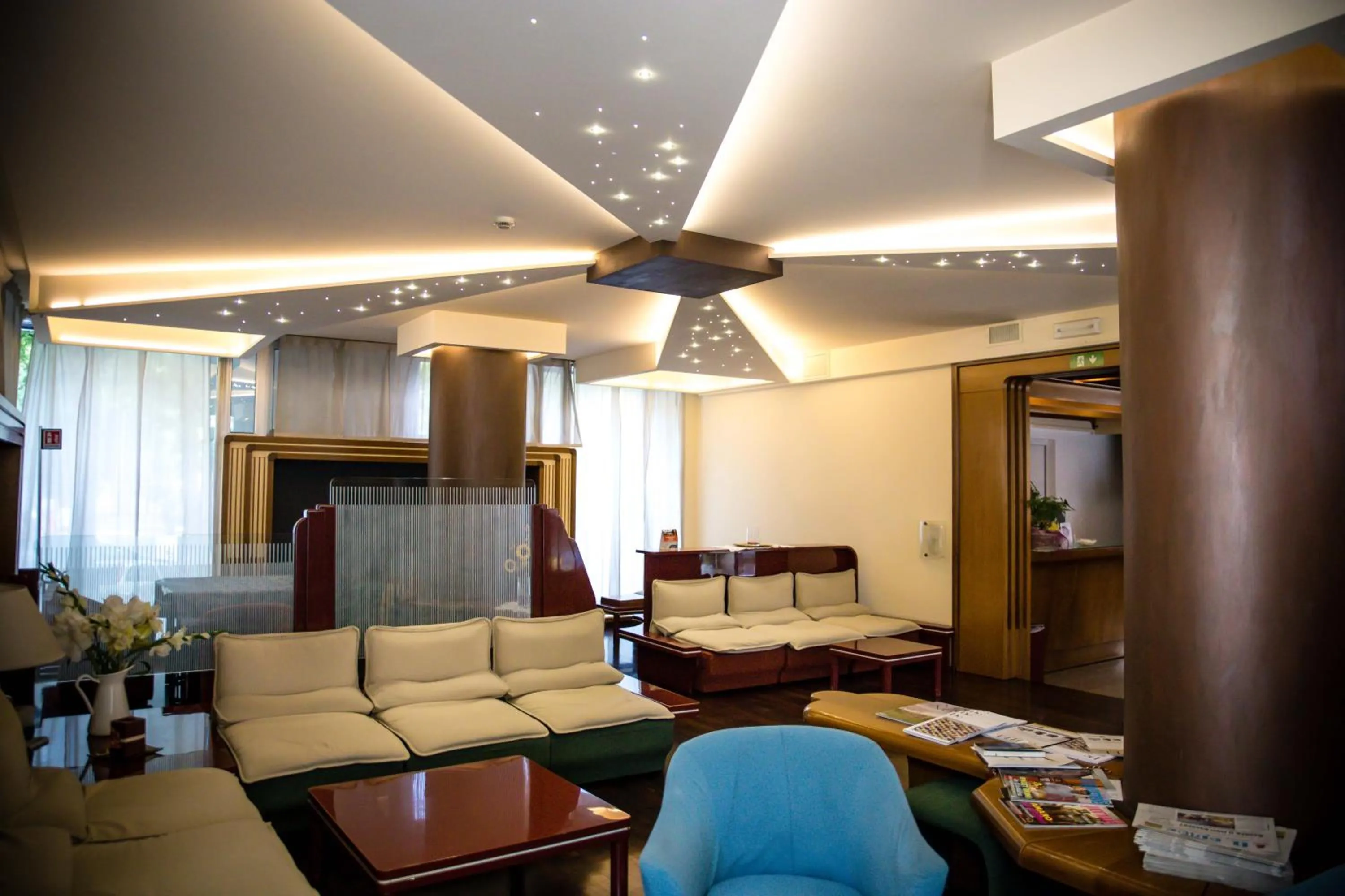 Communal lounge/ TV room in Hotel Citta' Di Conegliano