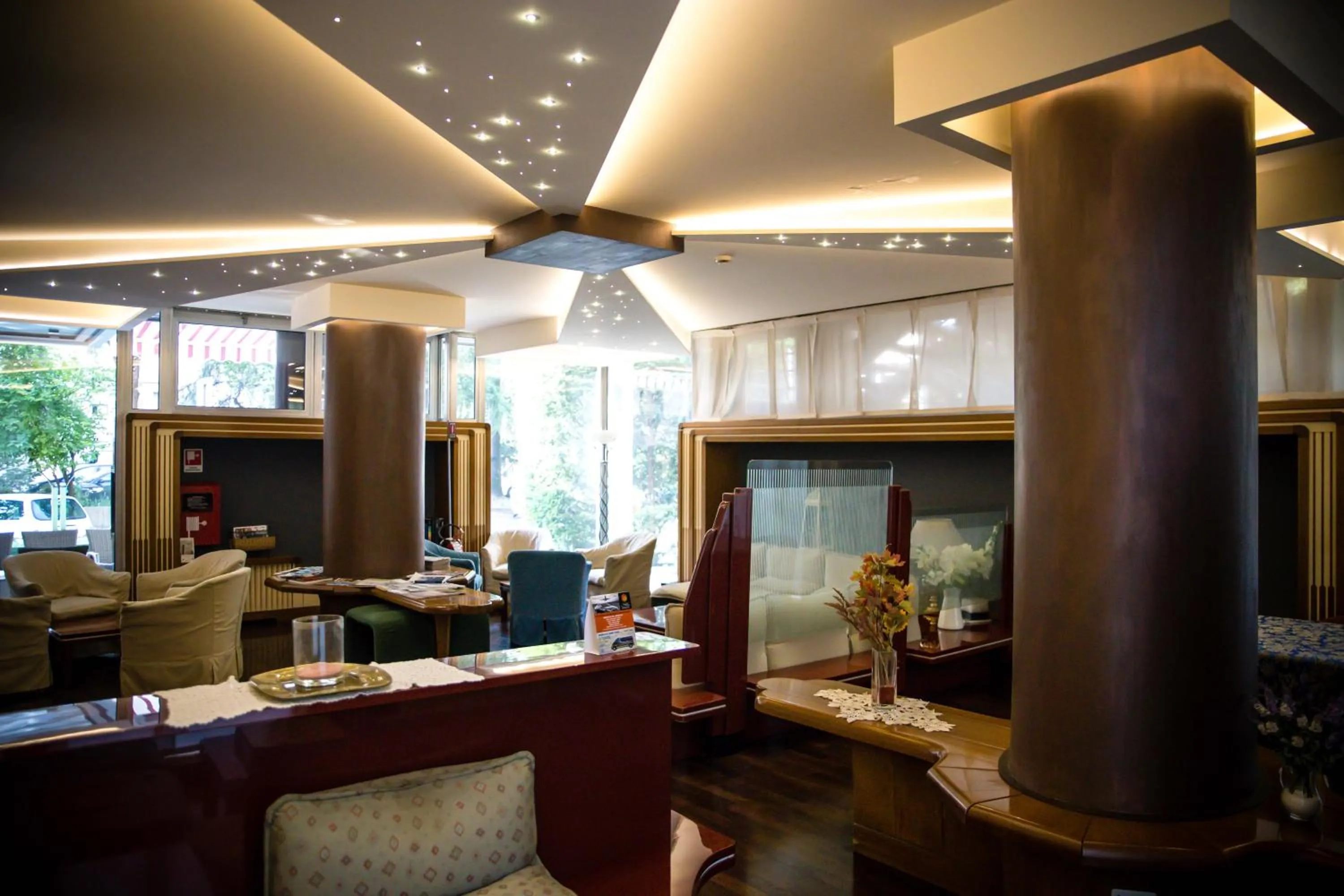 Communal lounge/ TV room in Hotel Citta' Di Conegliano