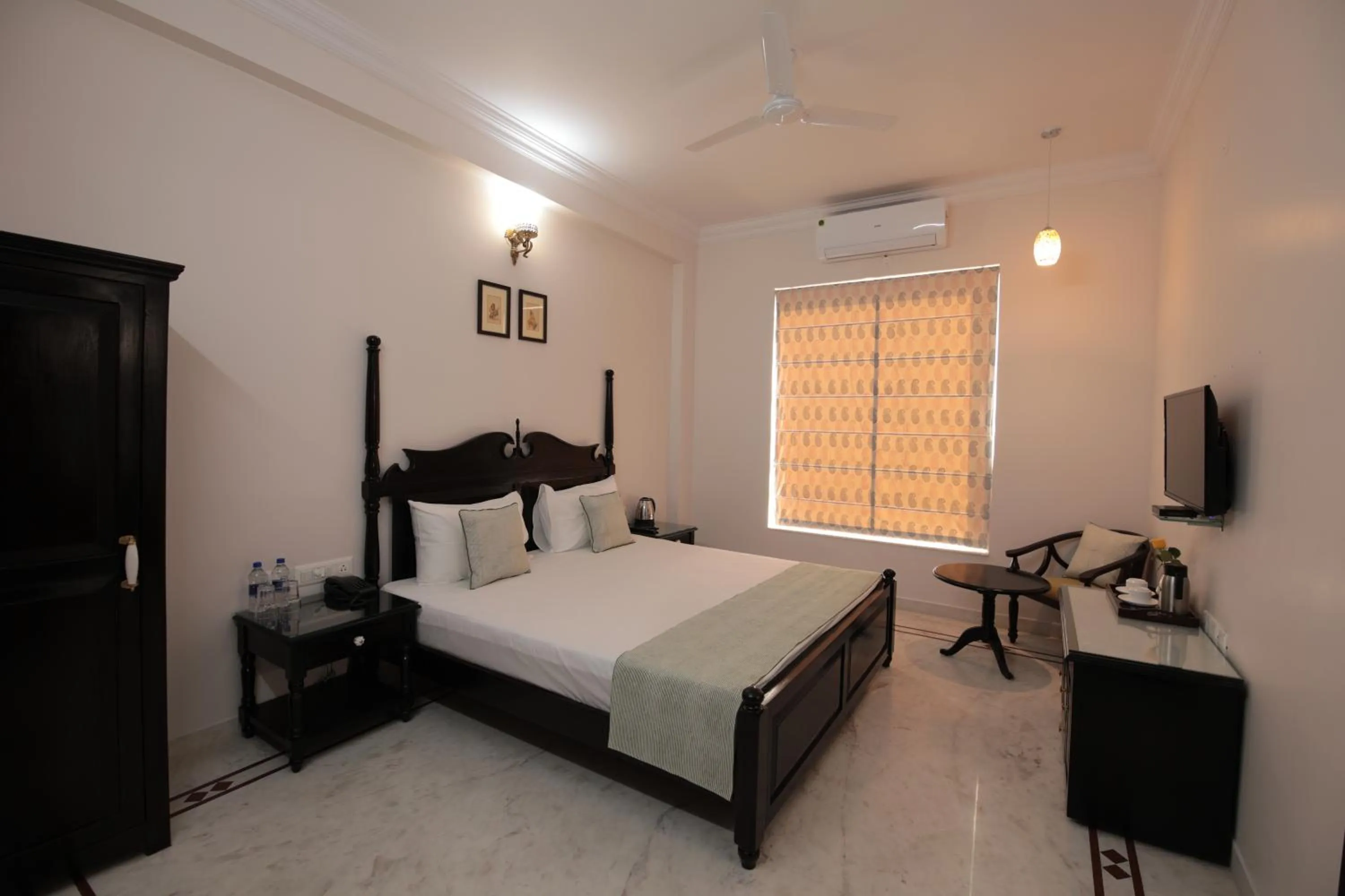 Bed in Jai Villa - A Boutique Hotel