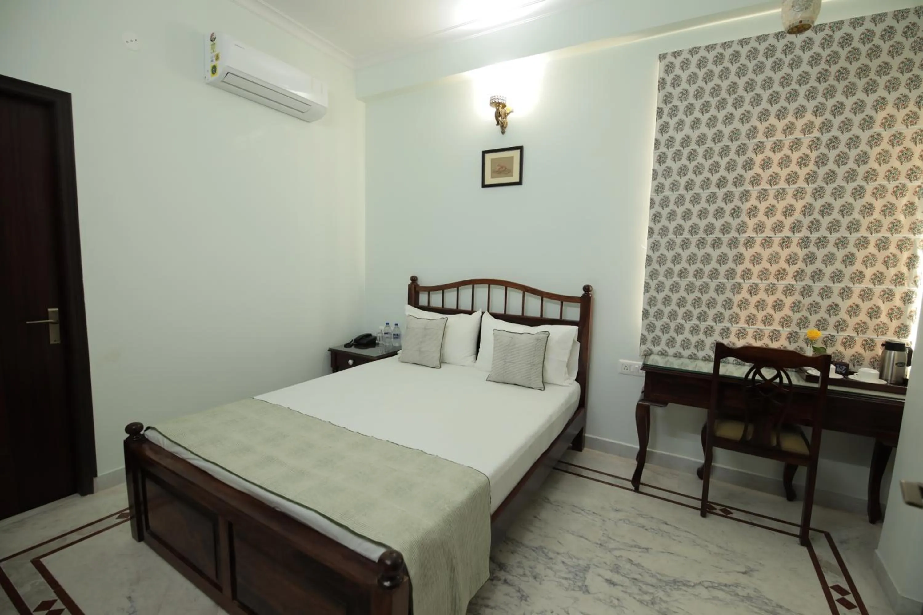 Bed in Jai Villa - A Boutique Hotel