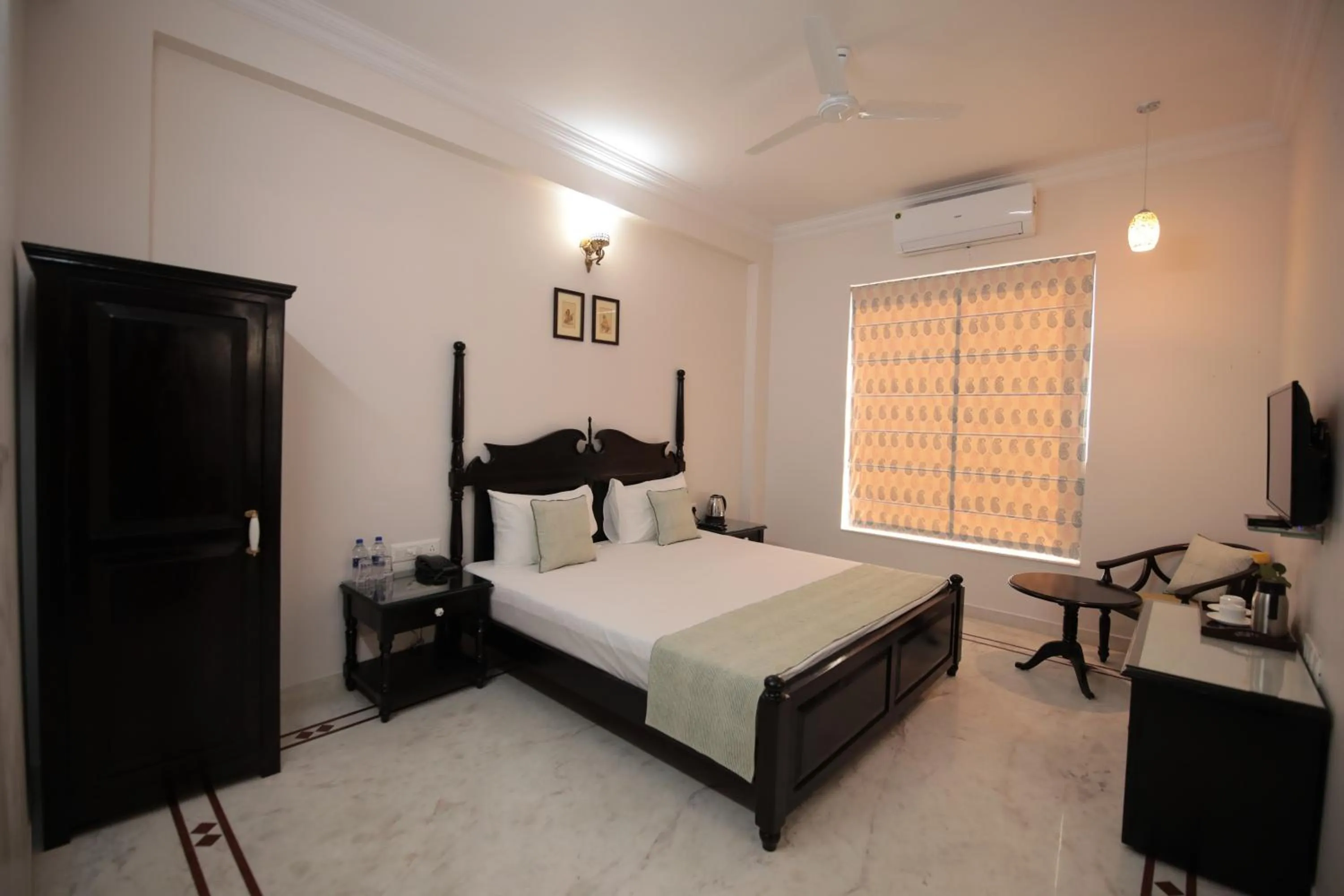 Bed in Jai Villa - A Boutique Hotel