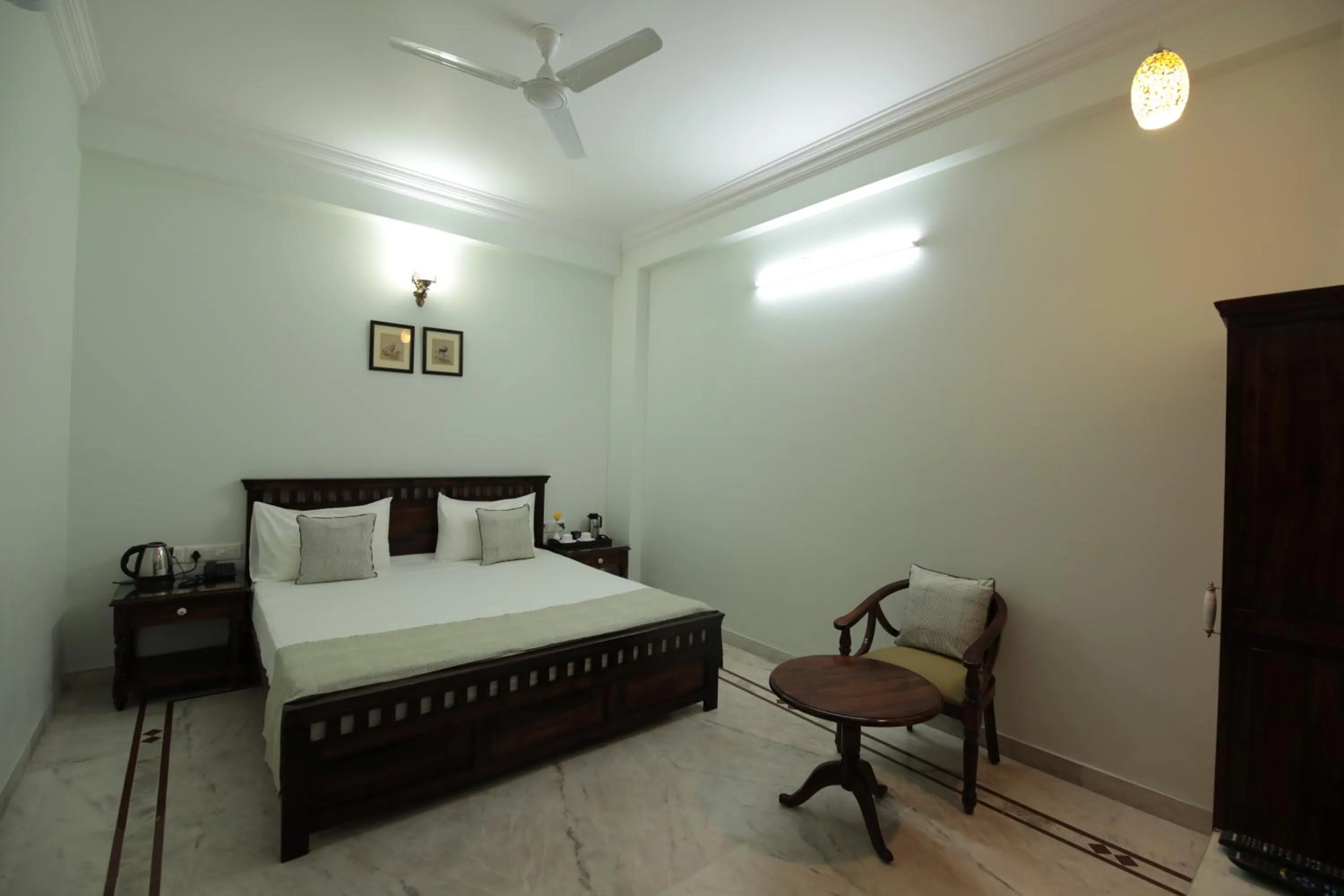 Bed in Jai Villa - A Boutique Hotel