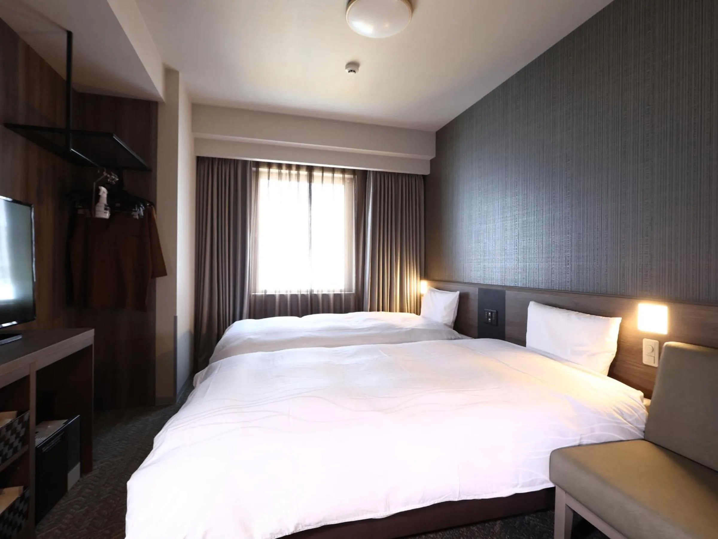 Bed in Dormy Inn Okayama Natural Hot Spring