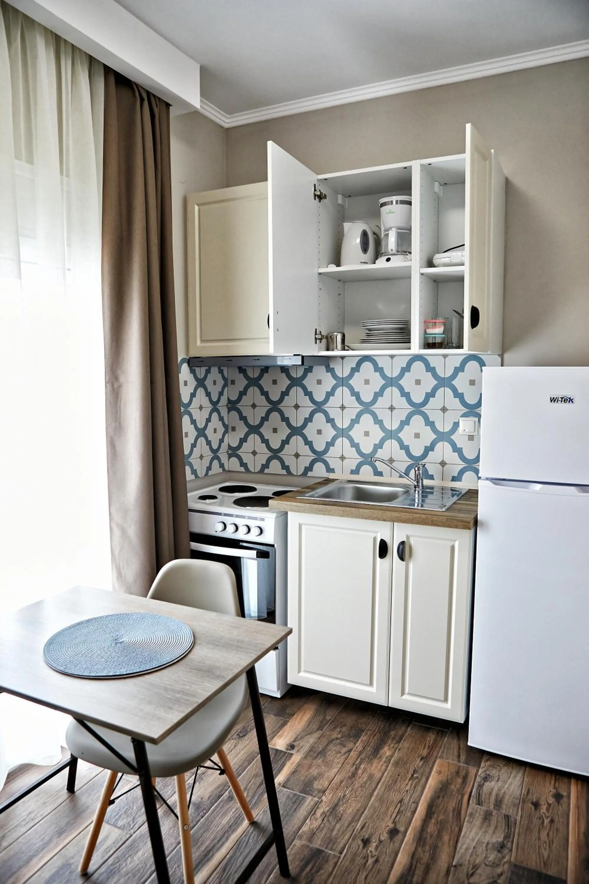 Kitchen or kitchenette in Romilia Guesthouse