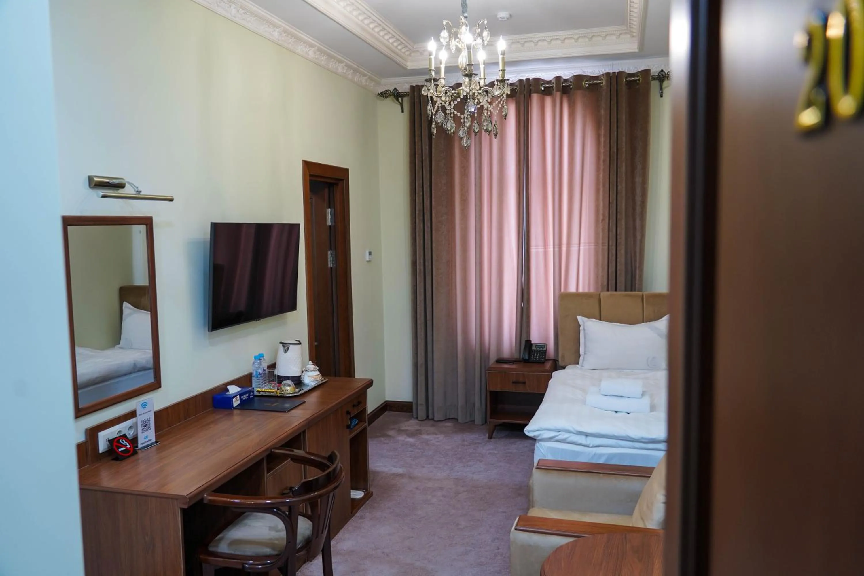 Bed in Sangzor Boutique Hotel