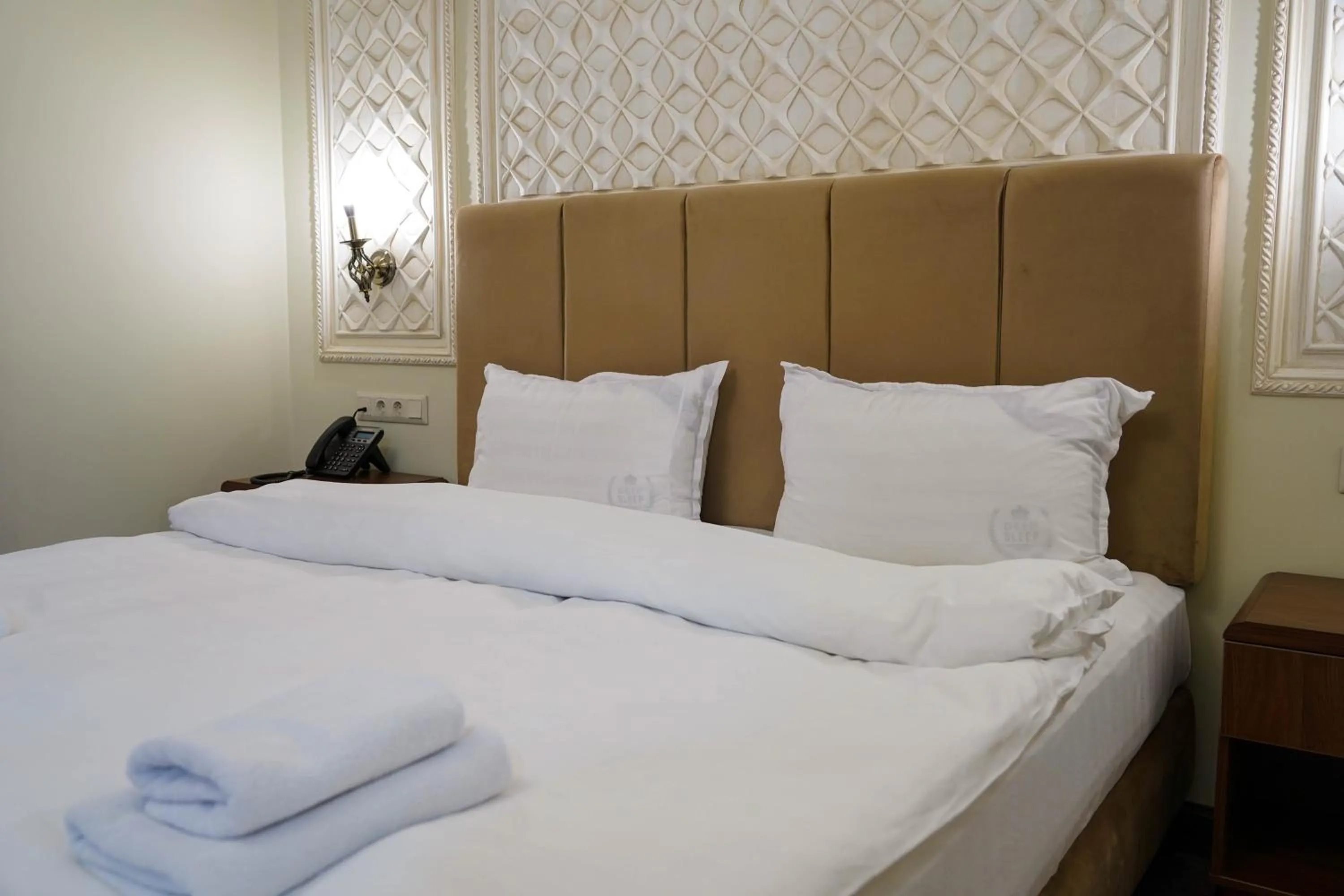 Bed in Sangzor Boutique Hotel