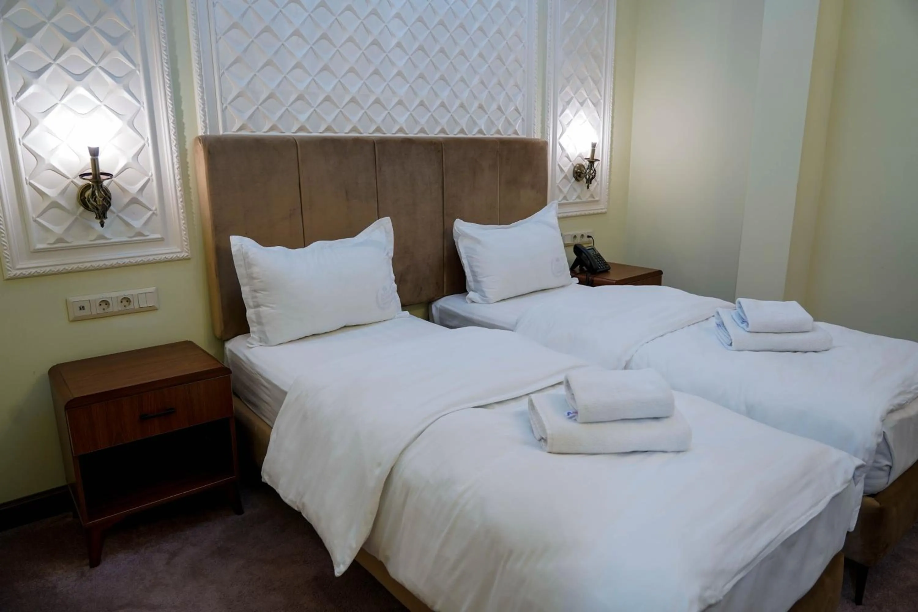 Bed in Sangzor Boutique Hotel