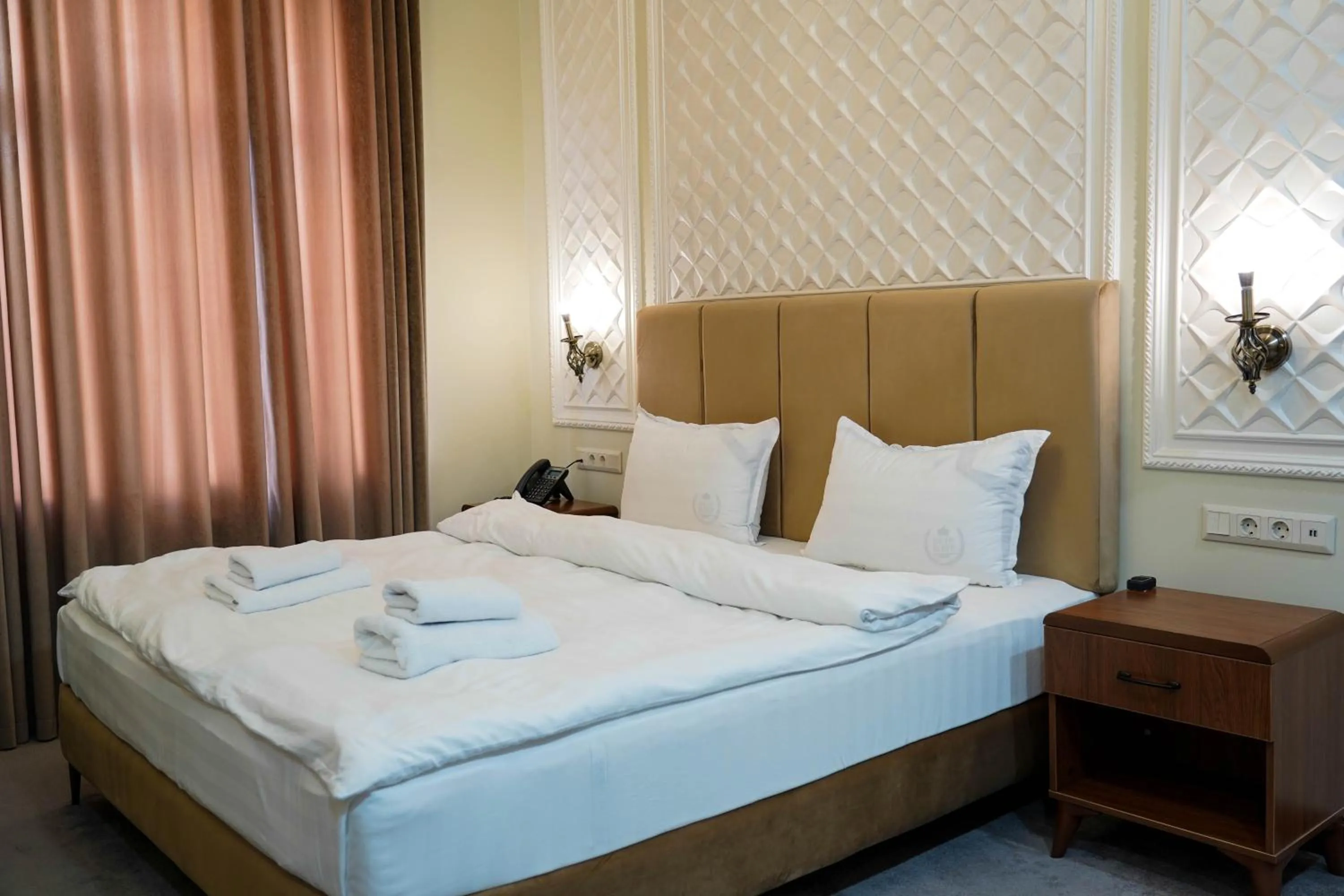 Bed in Sangzor Boutique Hotel