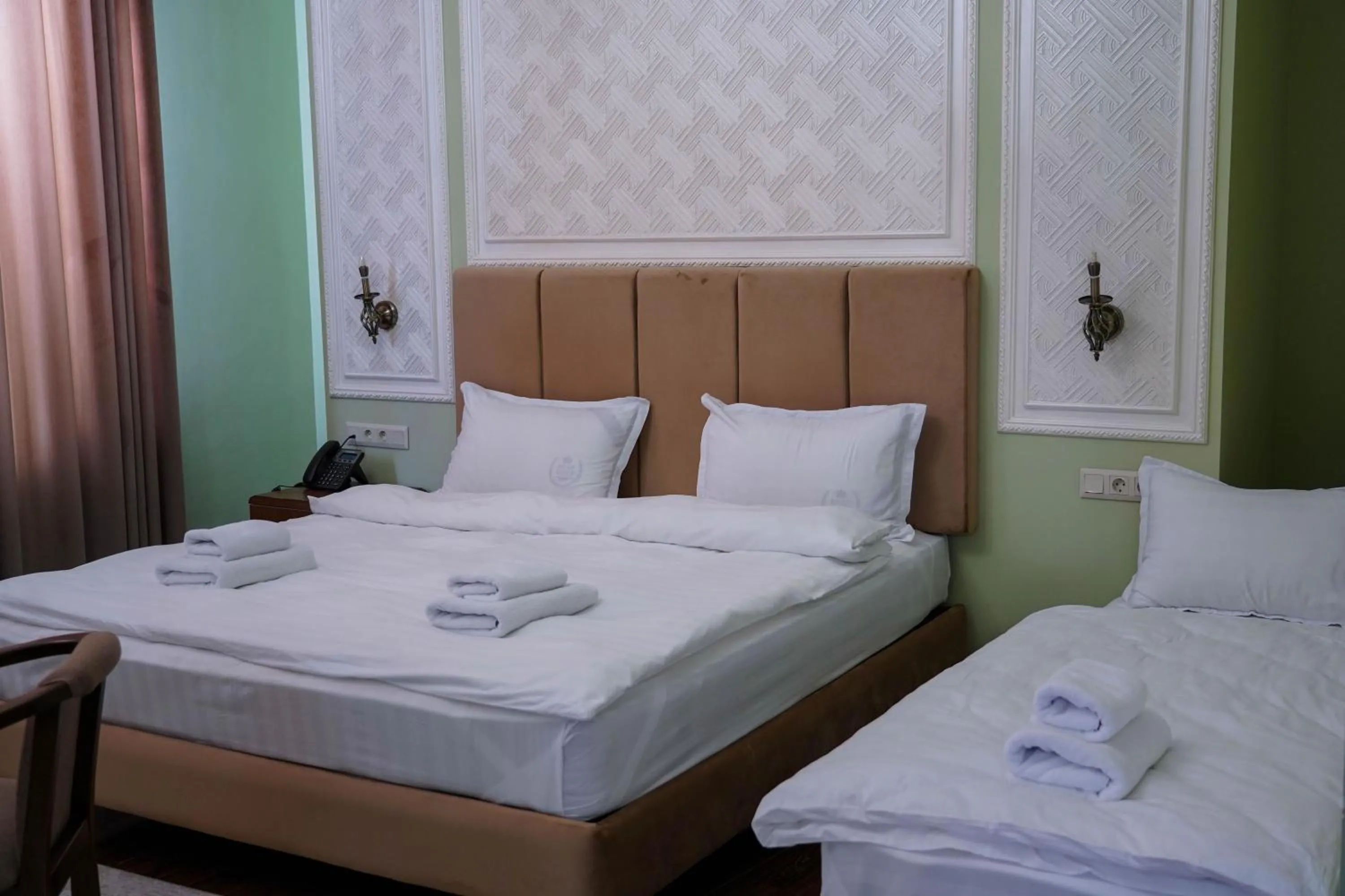 Bed in Sangzor Boutique Hotel