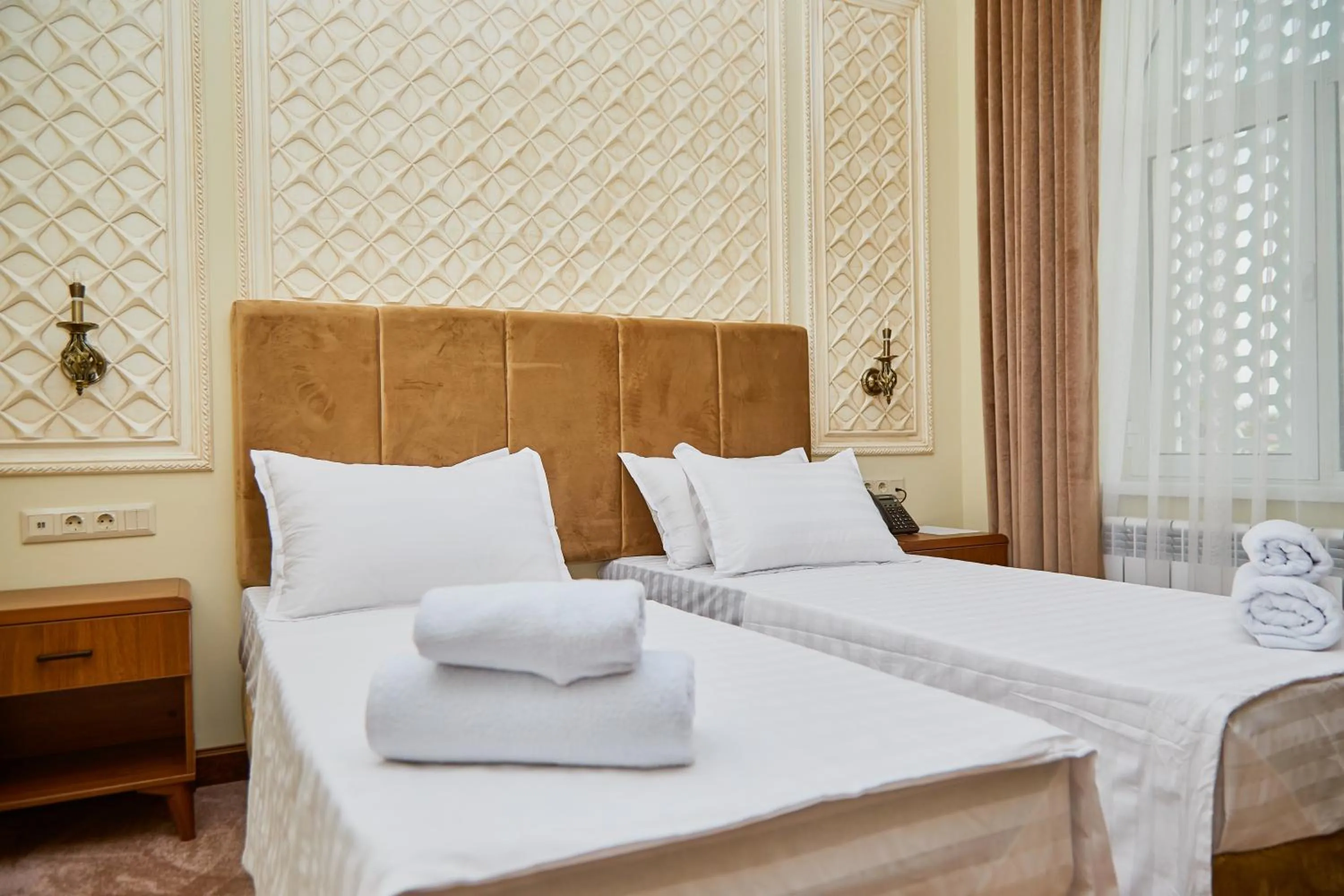 Bed in Sangzor Boutique Hotel