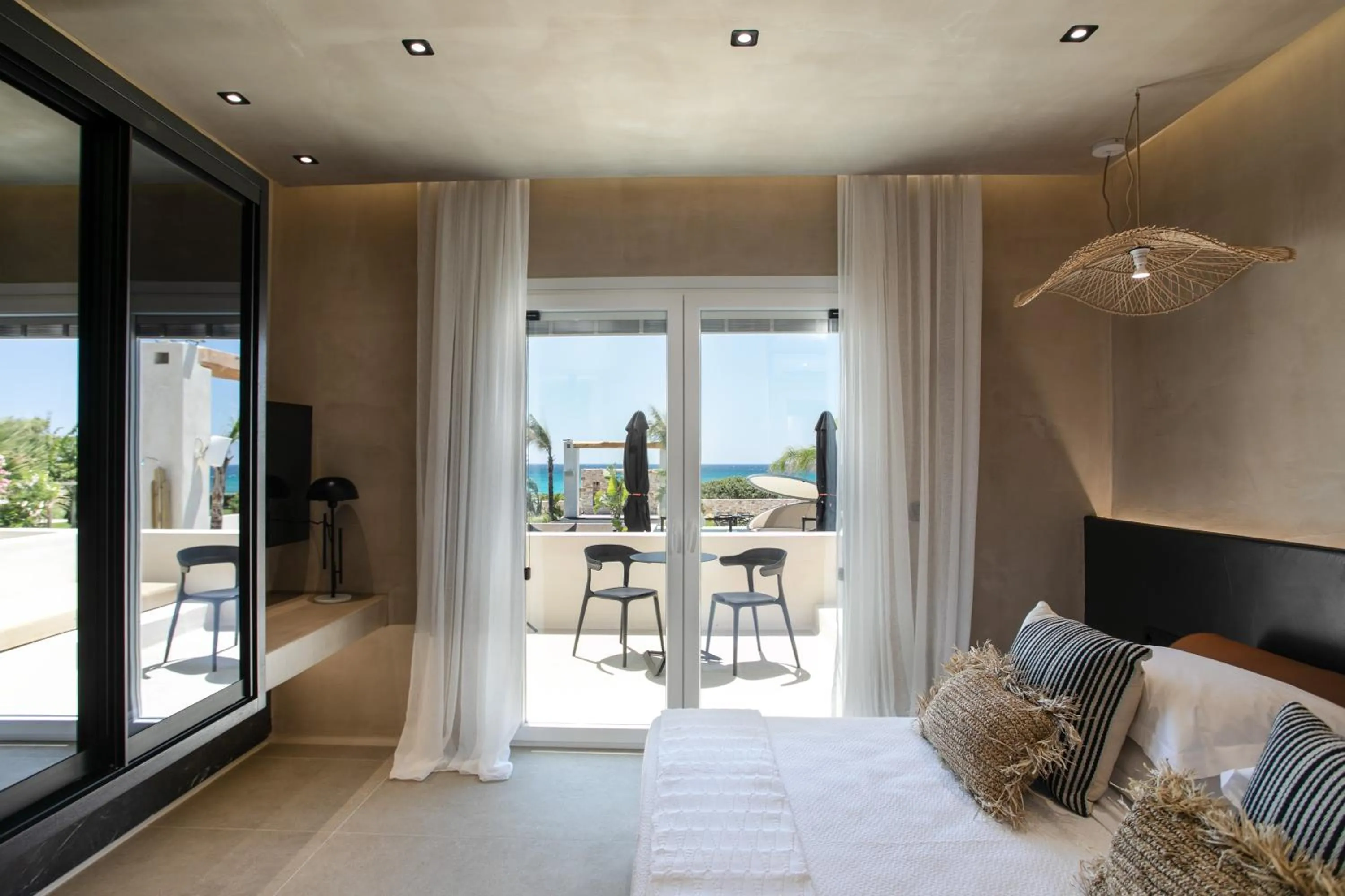 Balcony/Terrace, Bed in Eden Beachfront Residences & Suites