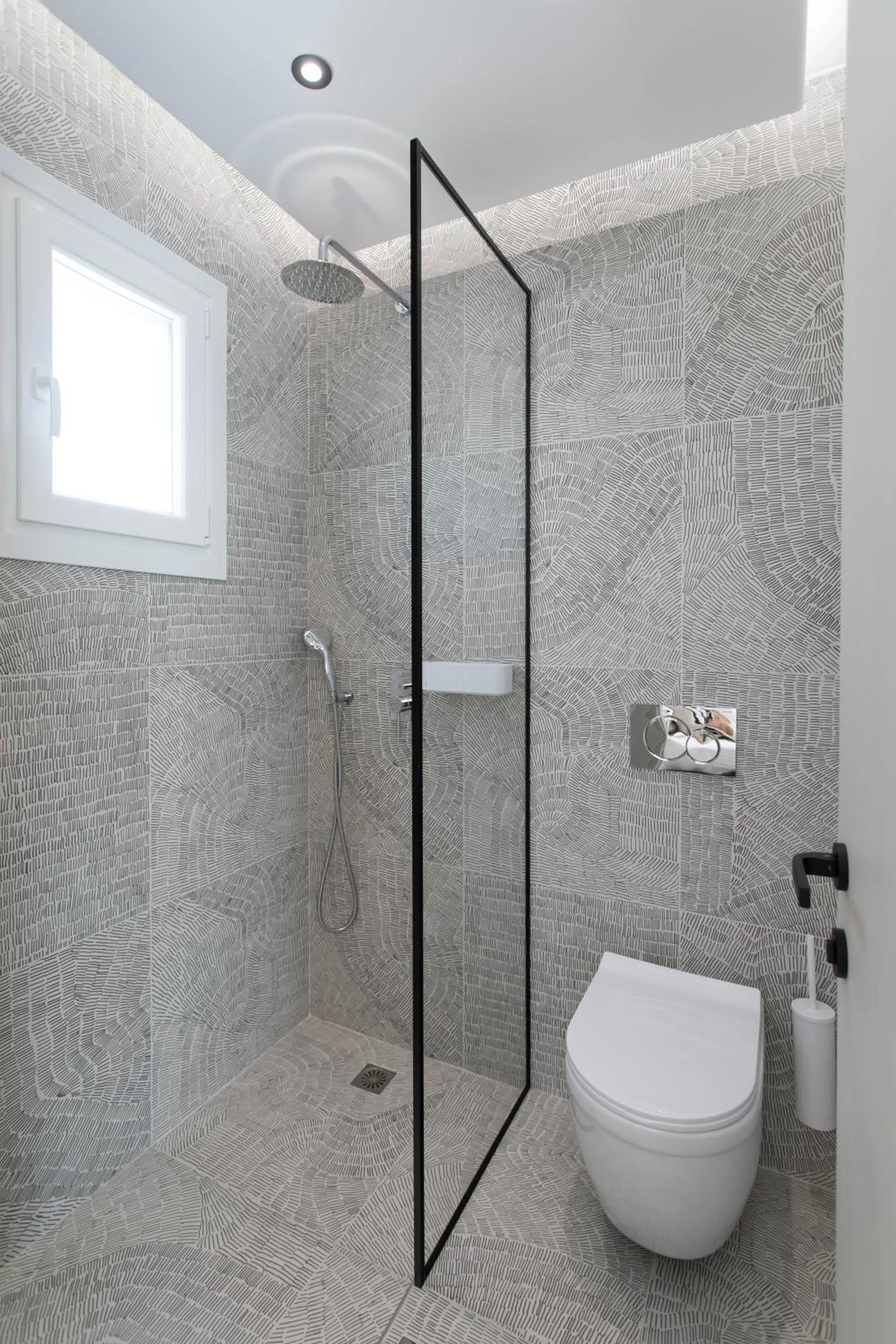 Shower in Eden Beachfront Residences & Suites