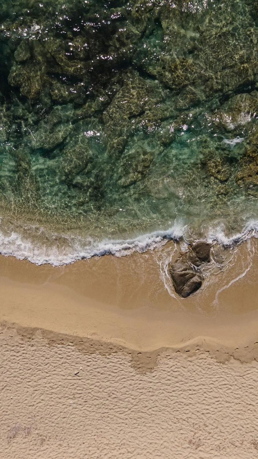 Beach in Eden Beachfront Residences & Suites