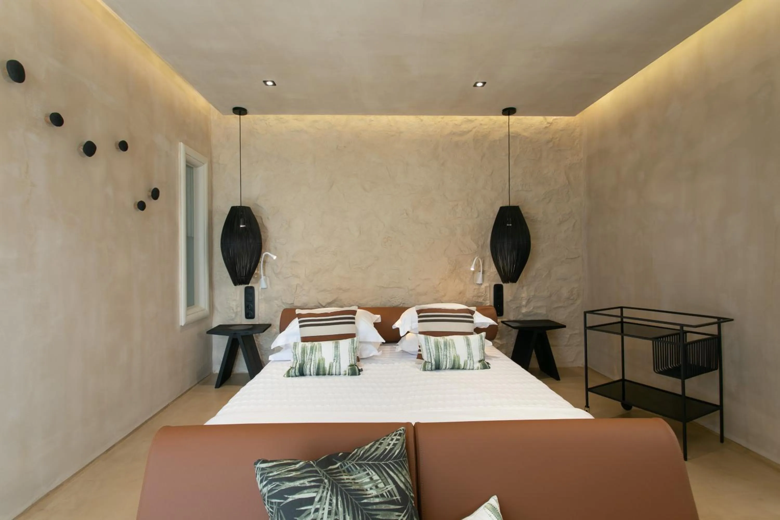 Bed in Eden Beachfront Residences & Suites