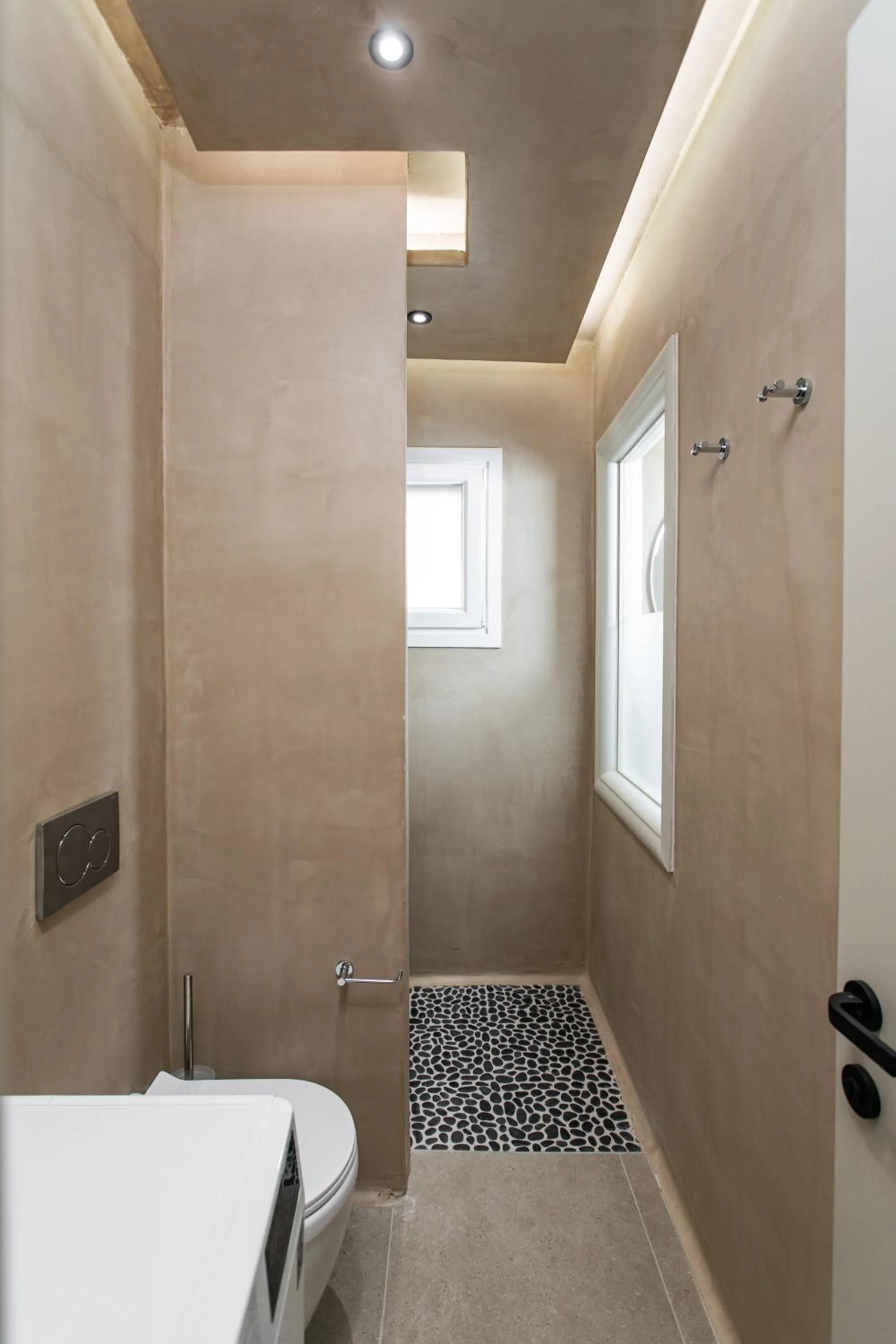 Bathroom in Eden Beachfront Residences & Suites