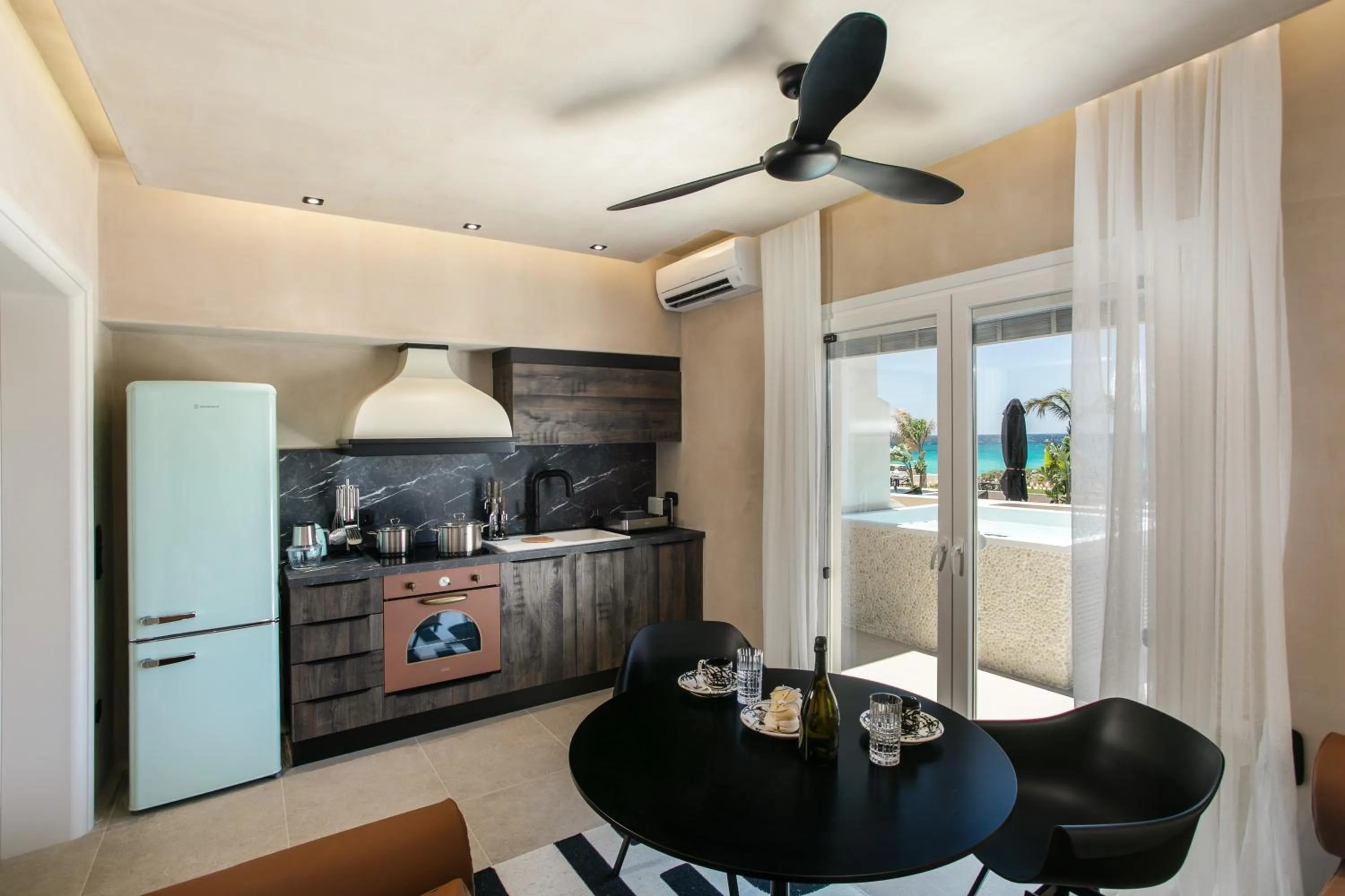 Kitchen or kitchenette in Eden Beachfront Residences & Suites