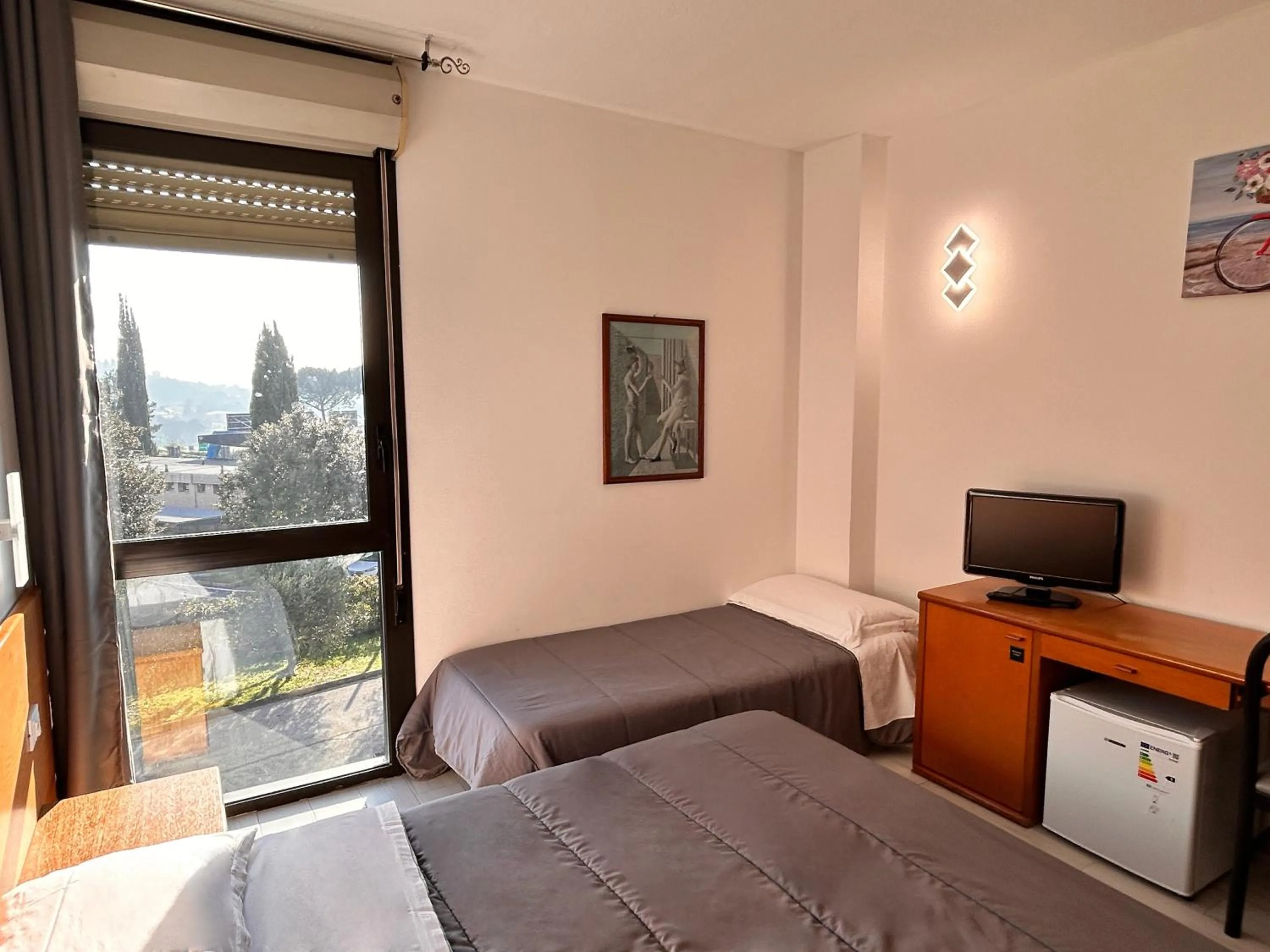 Bed in La Fenice Hotel