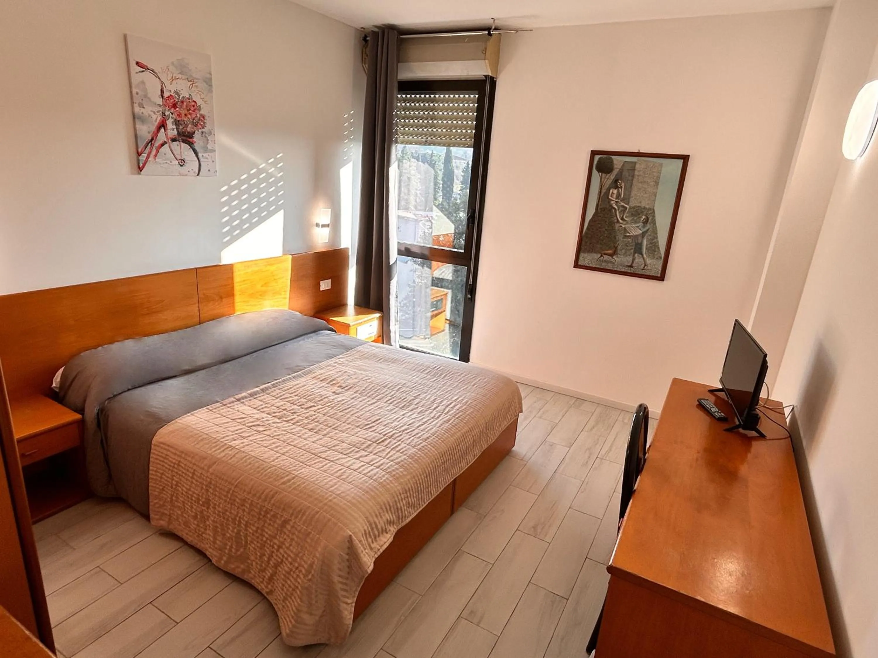 Bed in La Fenice Hotel