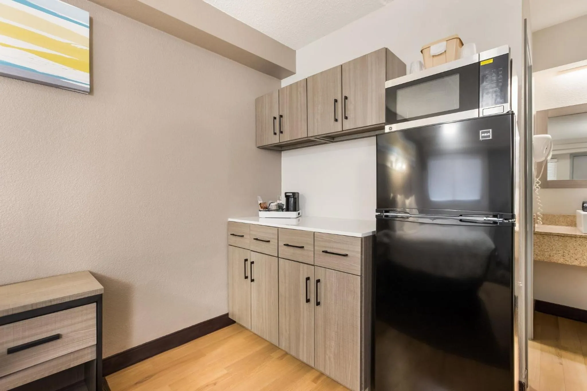 Bedroom in HomeTowne Studios by Red Roof Princeton - Ewing/ Lawrenceville