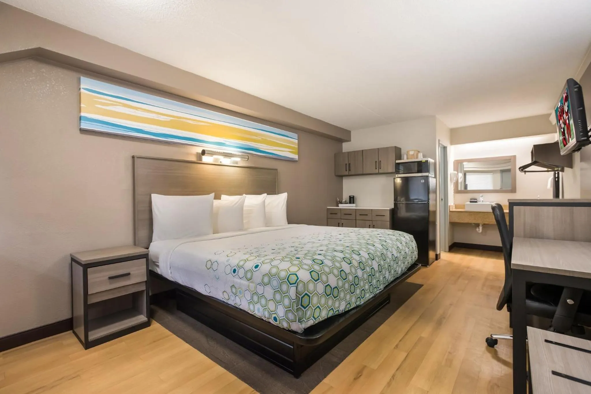 Bedroom, Bed in HomeTowne Studios by Red Roof Princeton - Ewing/ Lawrenceville