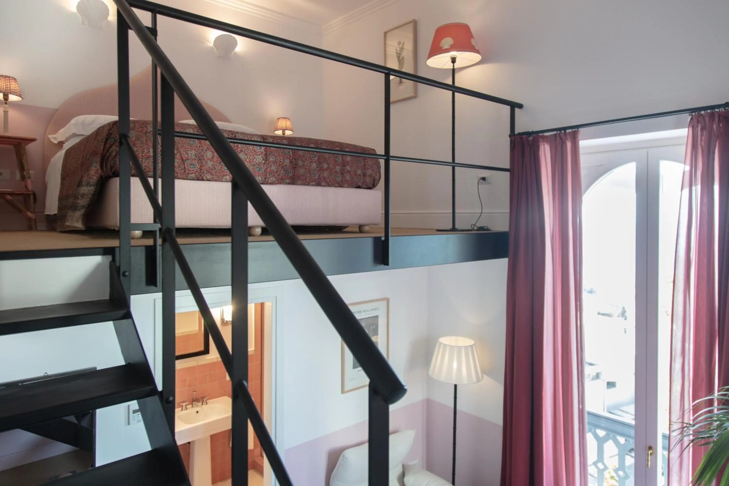 Bed in Il Capri Hotel