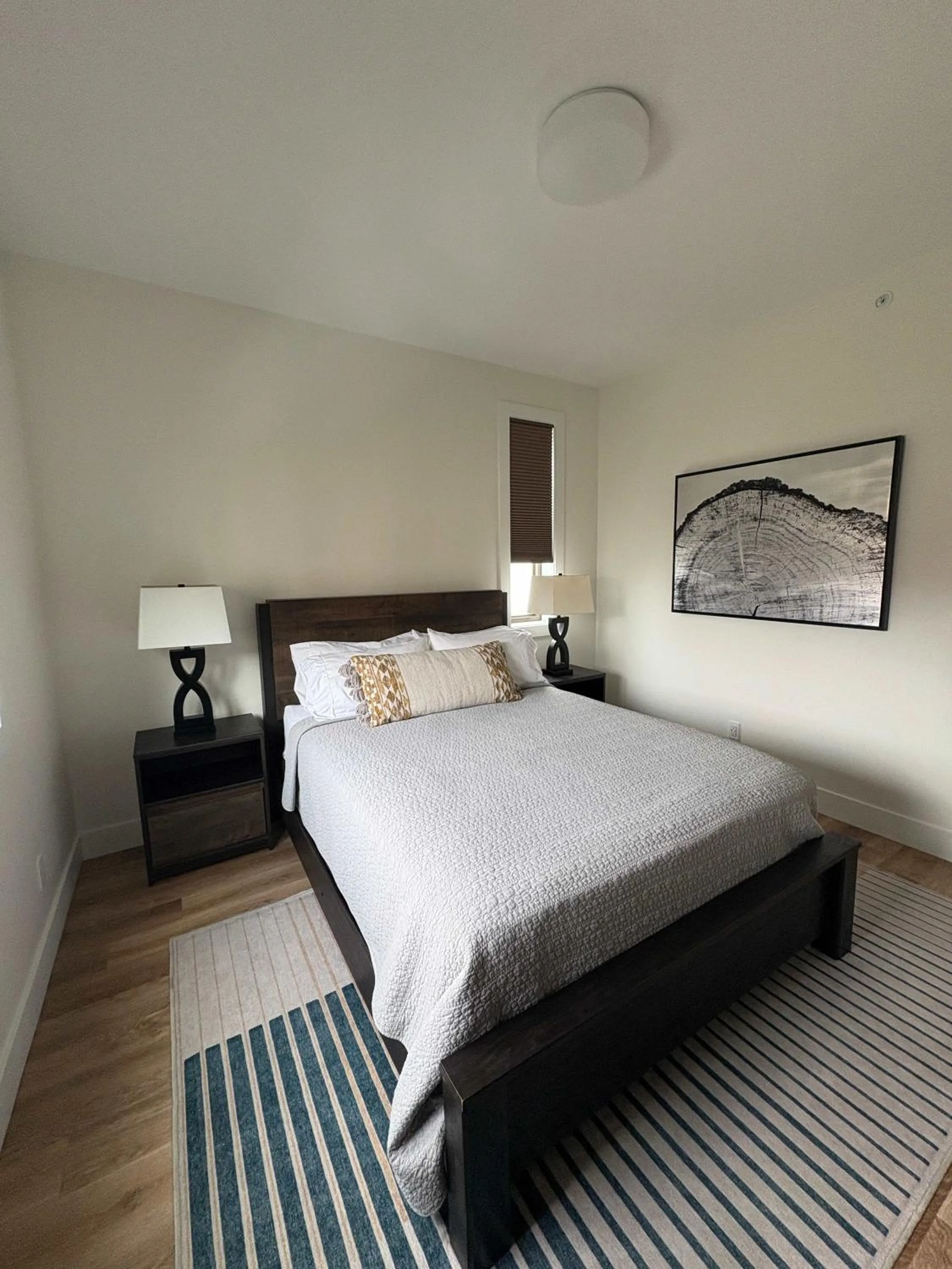 Bed in Downtown Traverse City Capri Condo 316