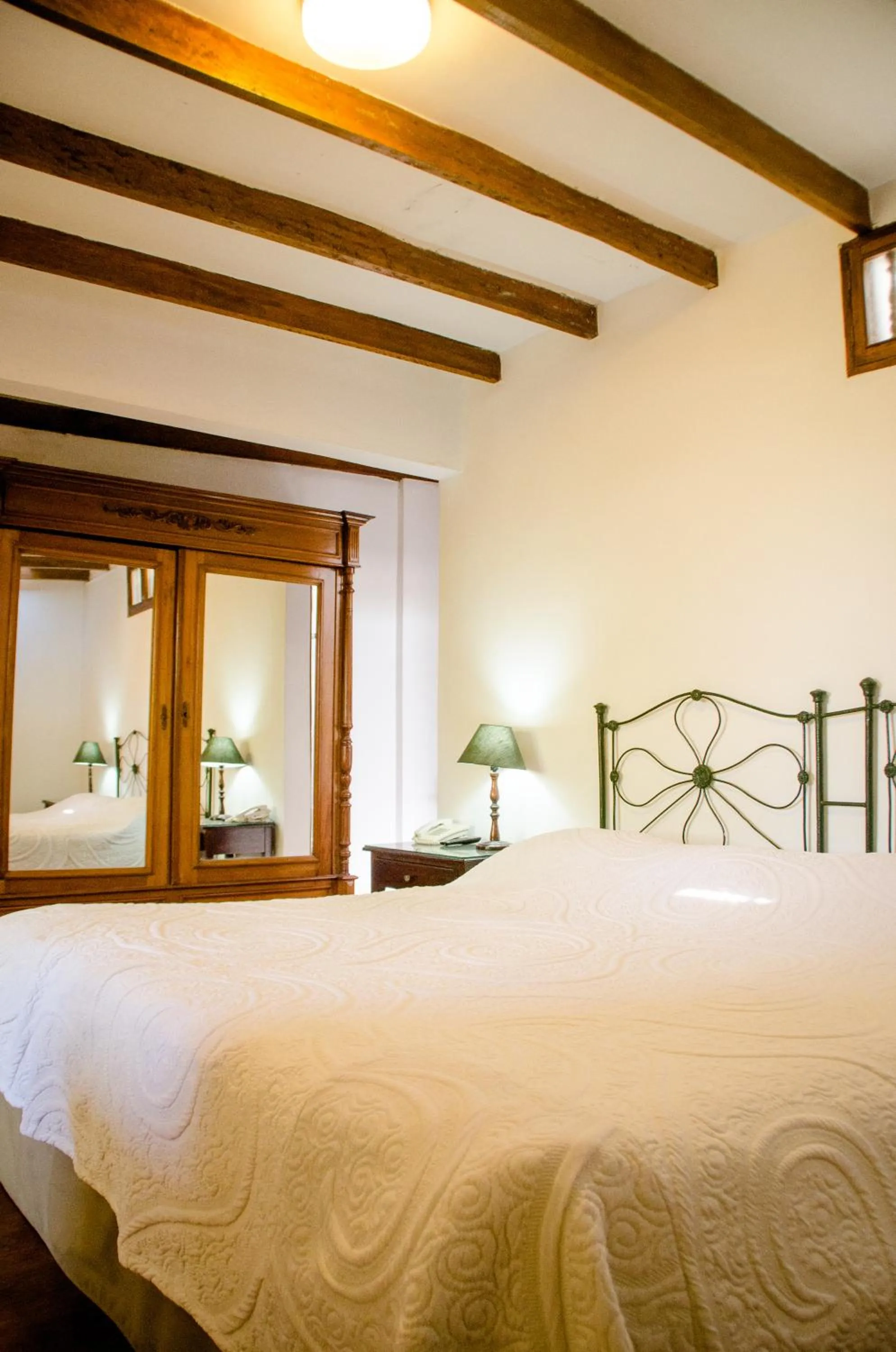 Bed in Hotel & Hacienda El Carmelo