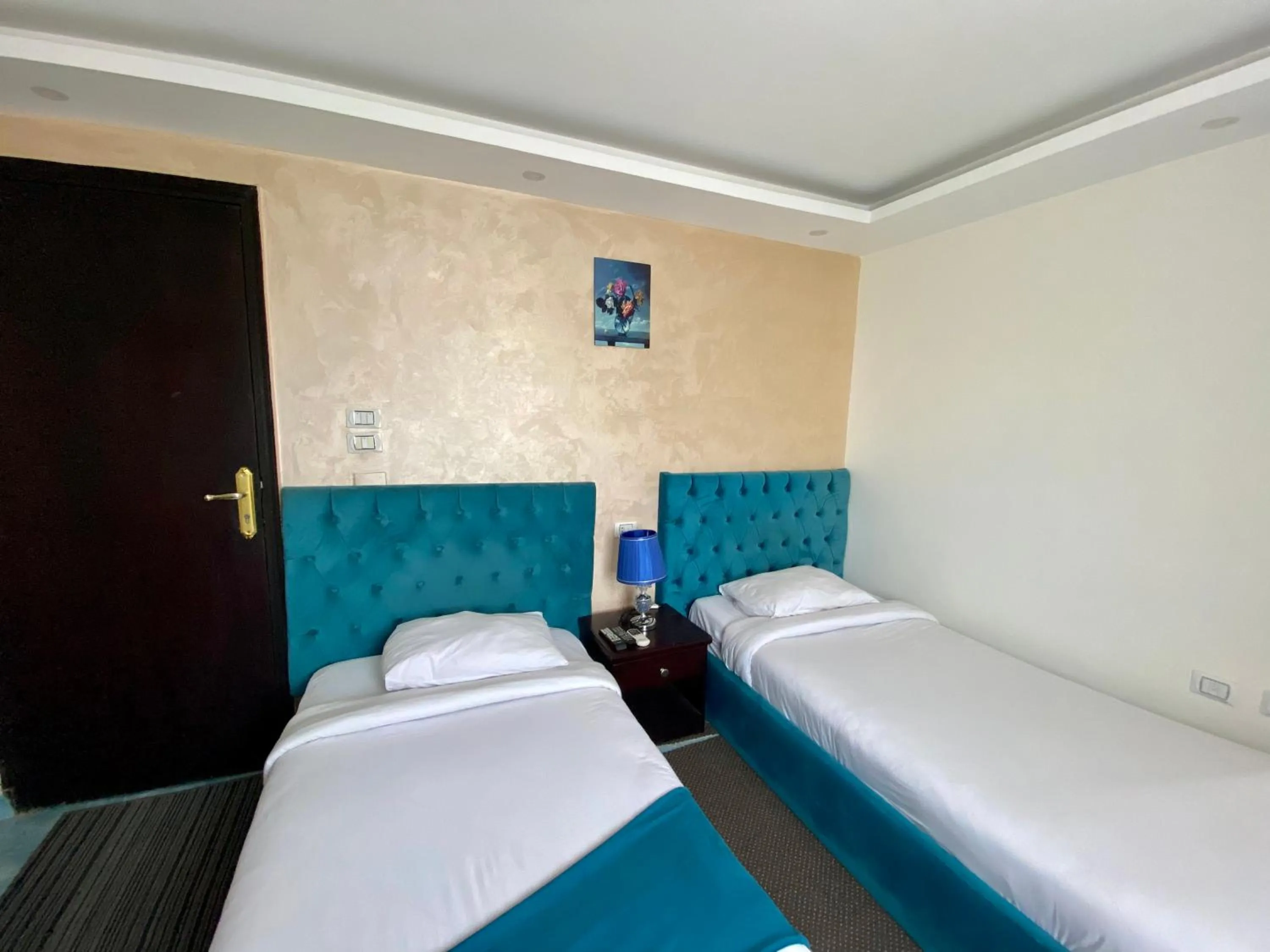 Bed in Golden Pyramids Inn