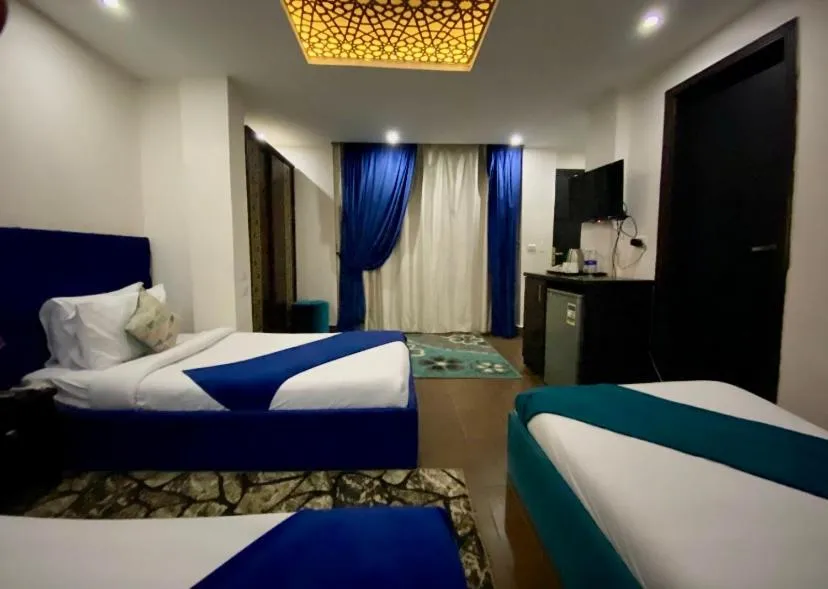 Bed in Golden Pyramids Inn