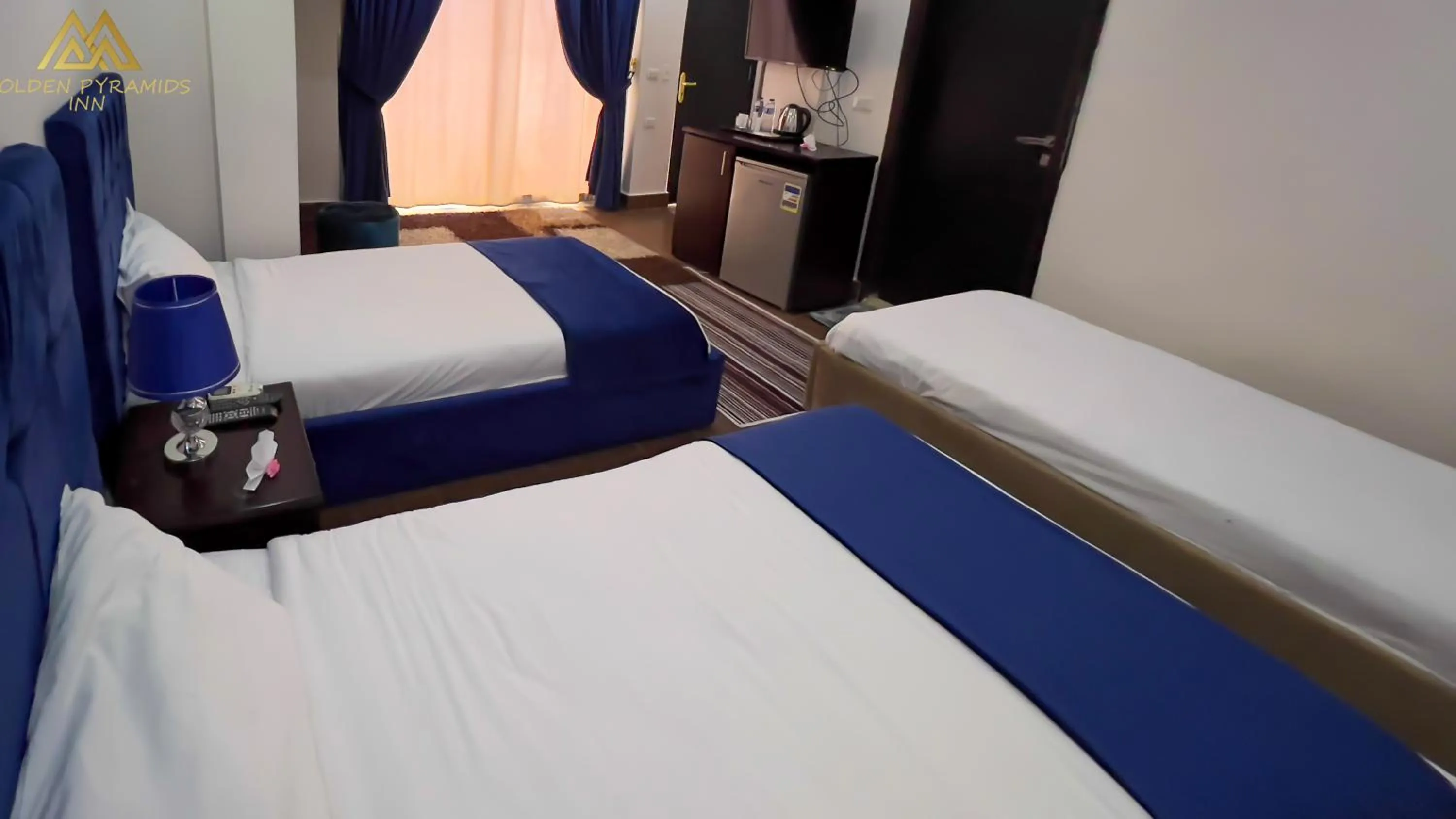 Bed in Golden Pyramids Inn