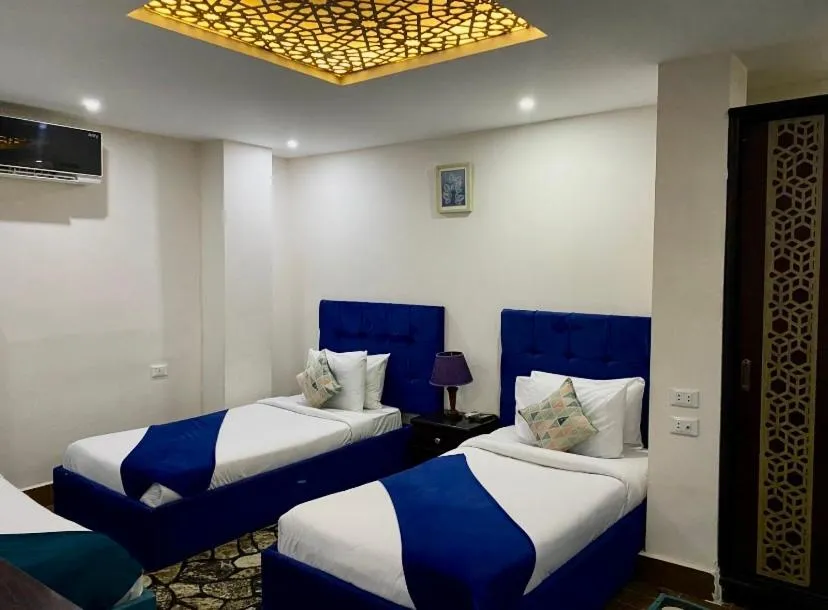 Bed in Golden Pyramids Inn