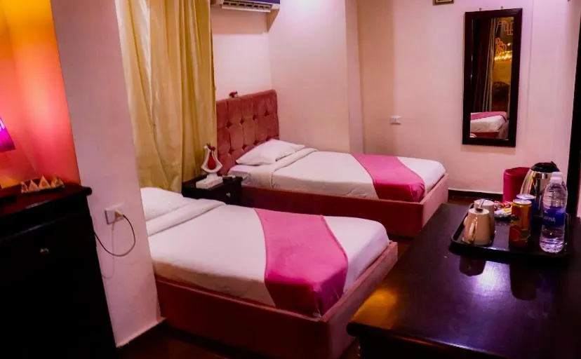 Bed in Golden Pyramids Inn