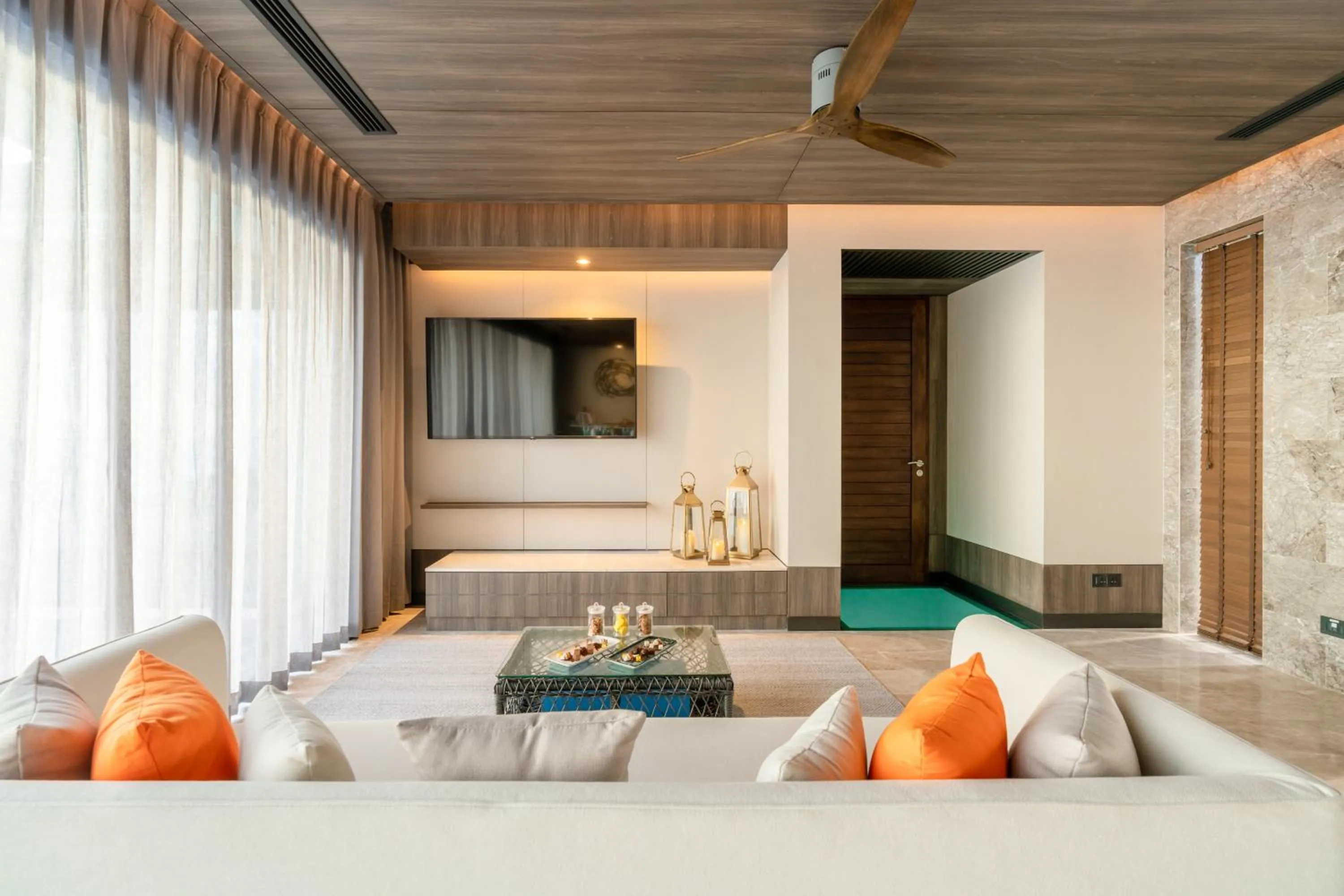 Living room, Bed in Madifushi Private Island- Free return seaplane transfr for min 5 nights