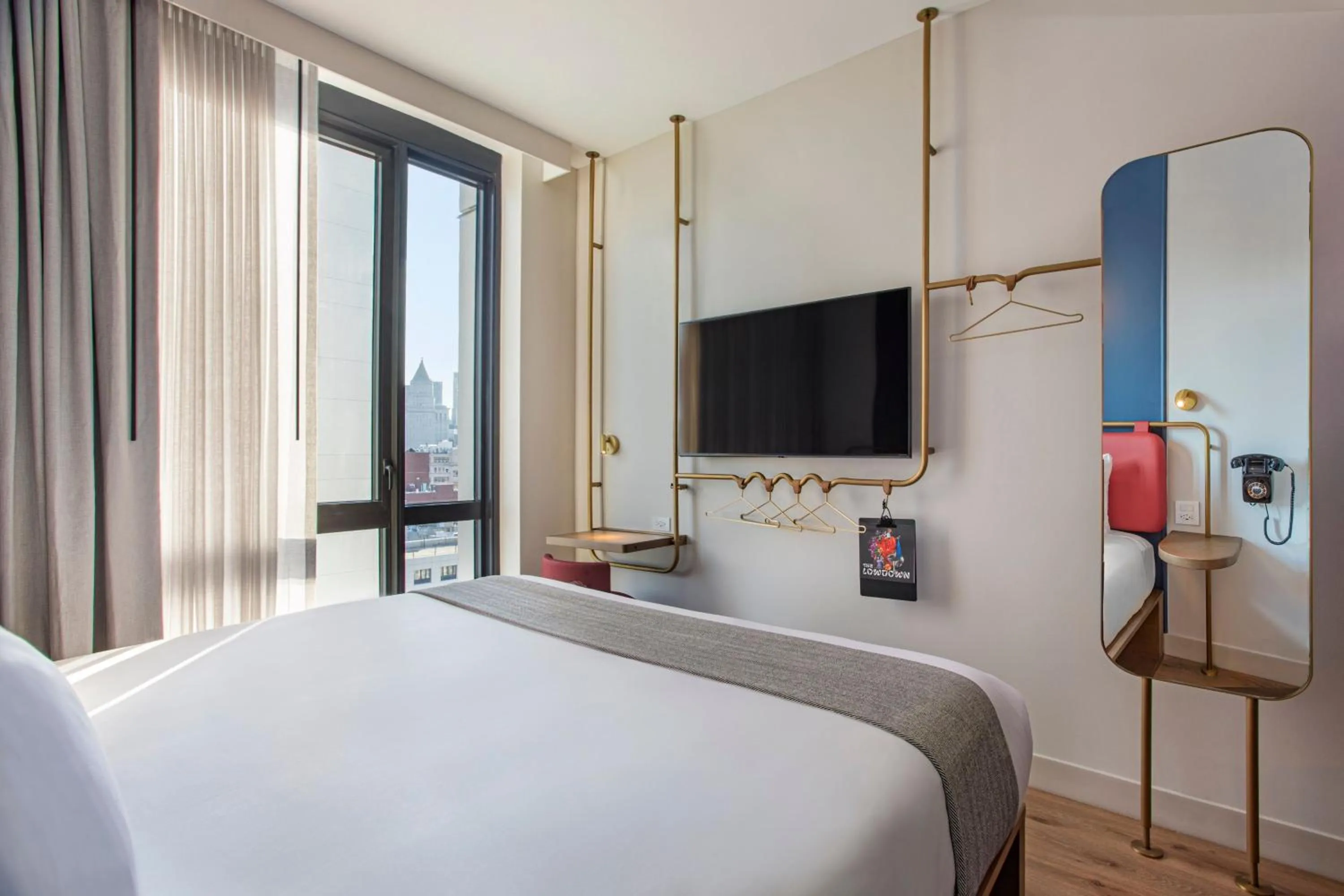 Photo of the whole room, Bed in Moxy NYC Lower East Side