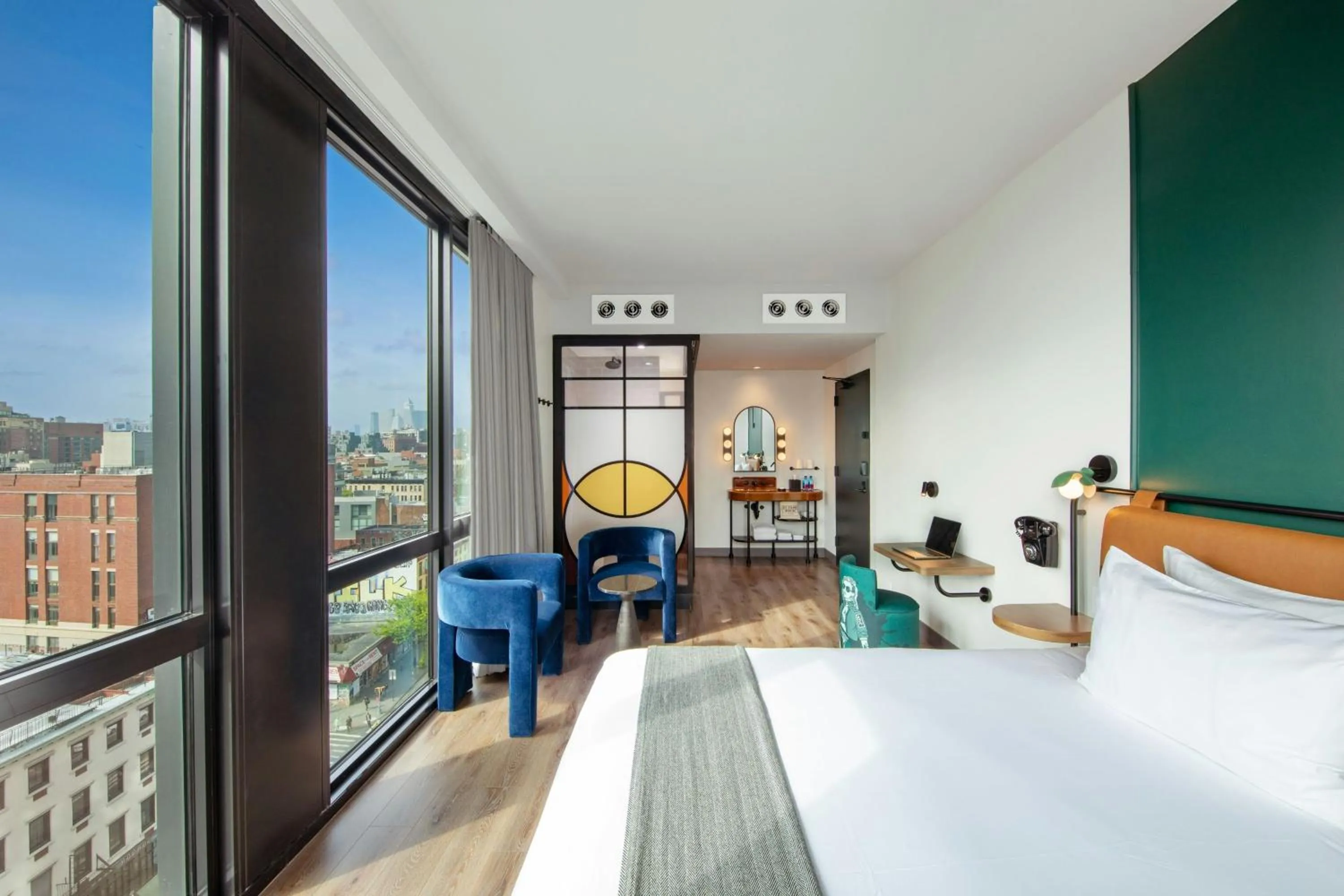 Photo of the whole room, Bed in Moxy NYC Lower East Side