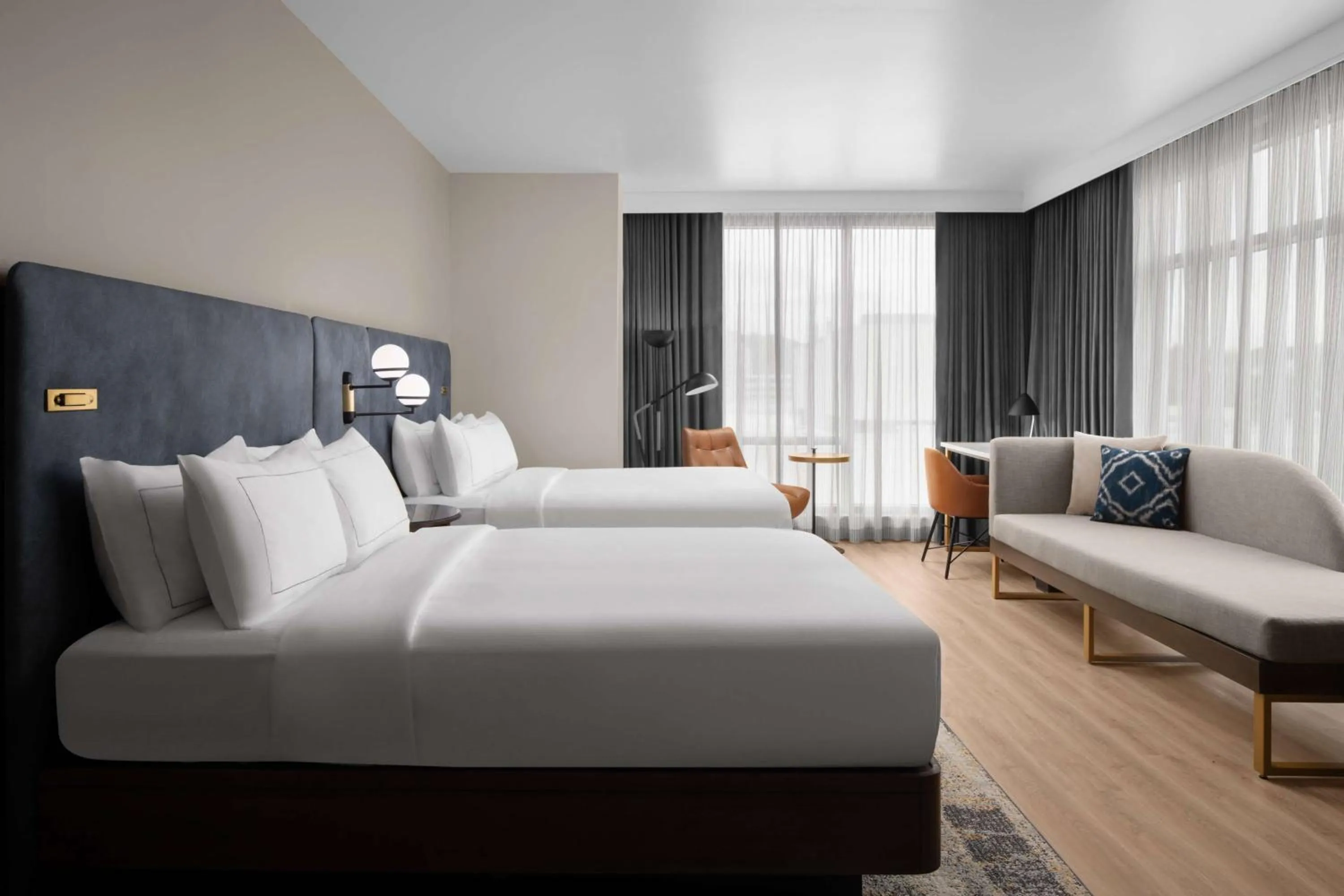 Living room, Bed in Hotel West & Main Conshohocken, Tapestry Collection Hilton