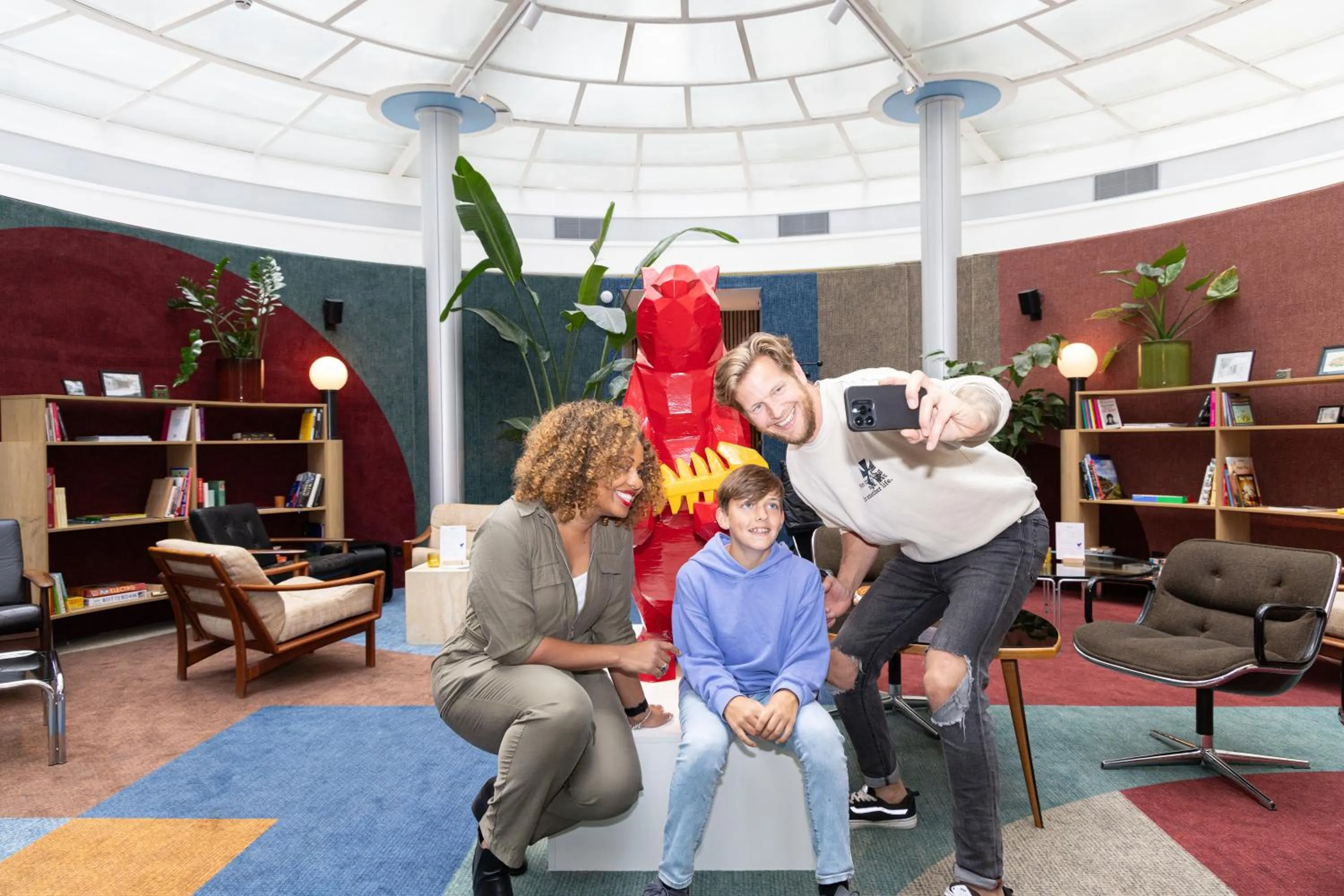 Communal lounge/ TV room in Motto By Hilton Rotterdam Blaak