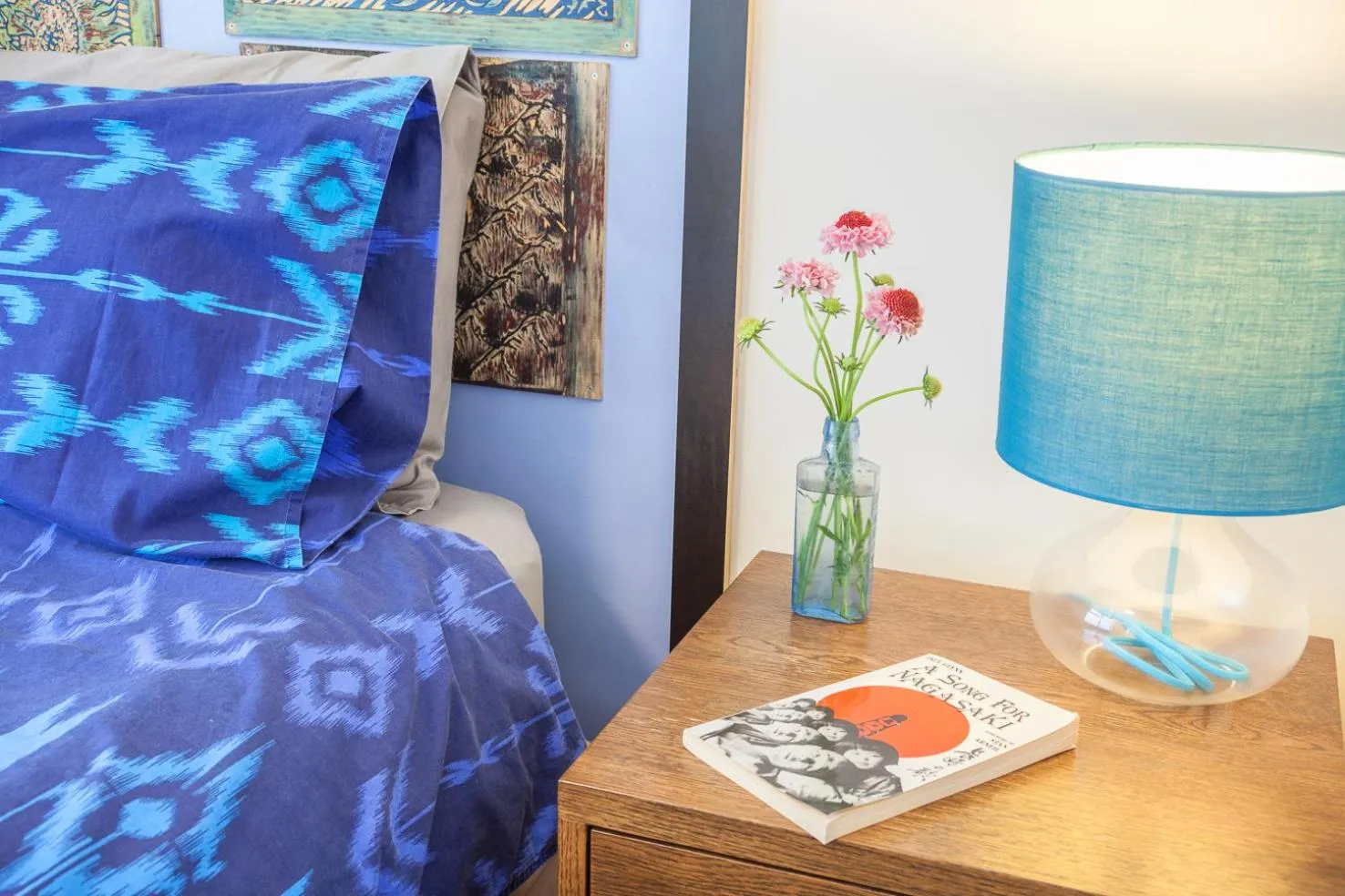 Bed, Seating Area in One of a Kind Apartments