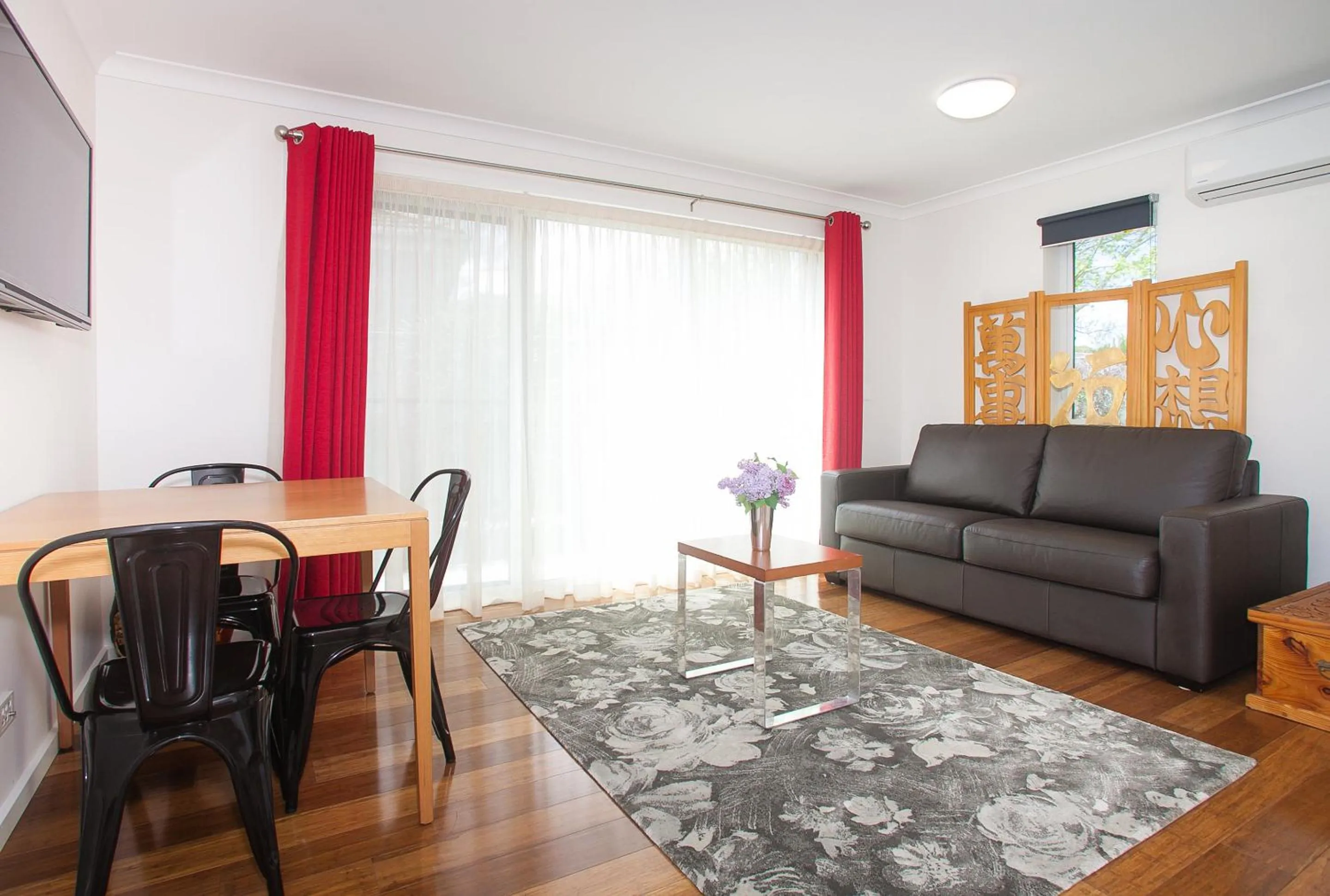Living room, Seating Area in One of a Kind Apartments