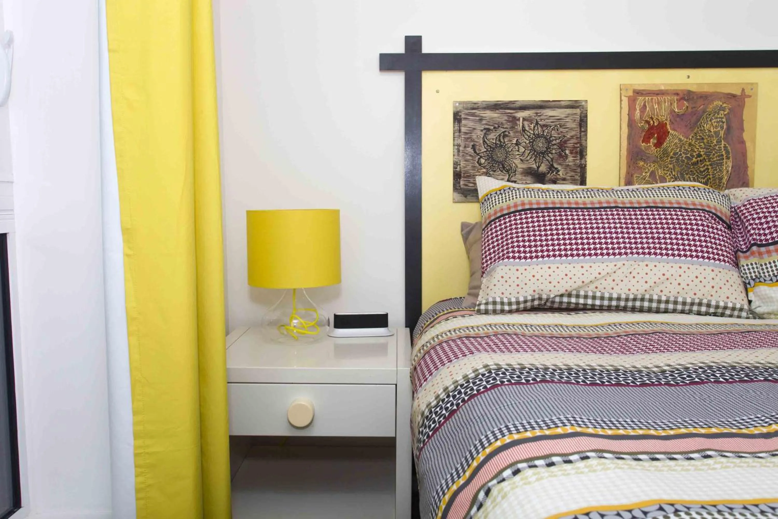 Bed in One of a Kind Apartments