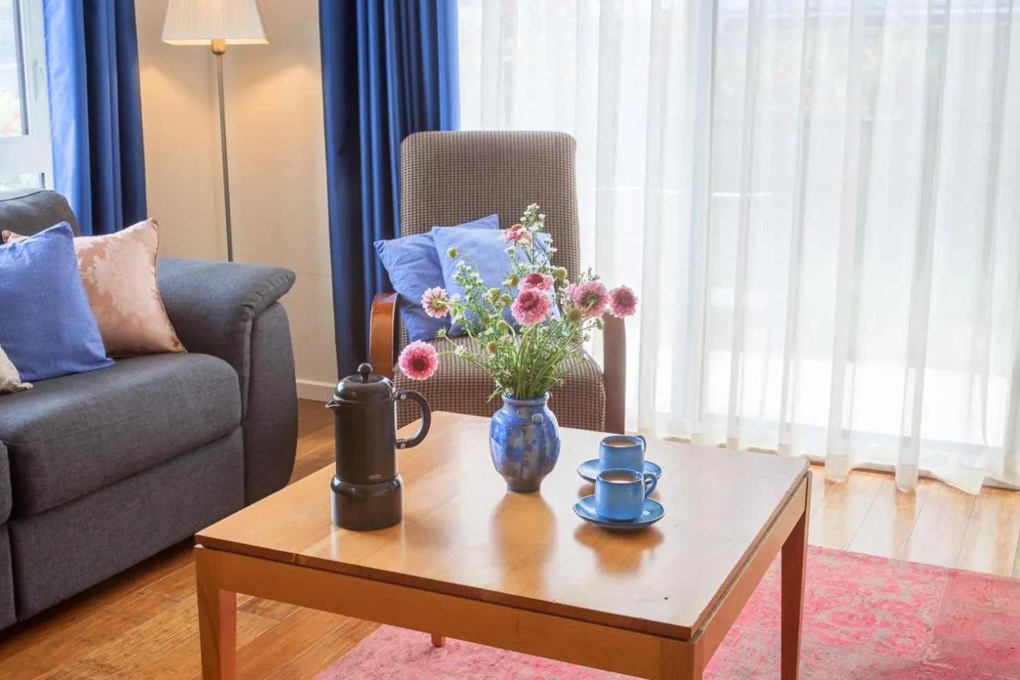 Living room, Seating Area in One of a Kind Apartments