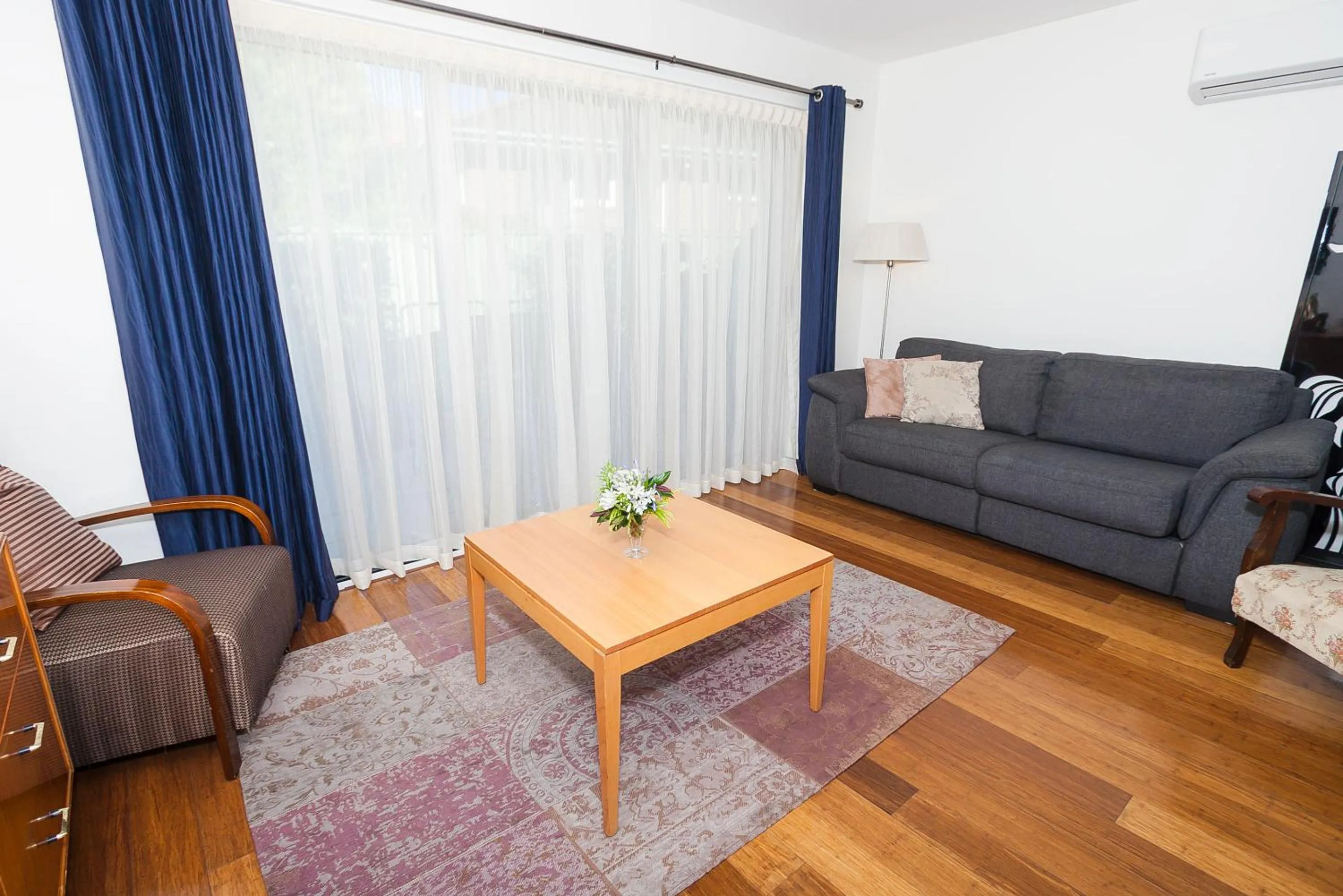 Living room, Seating Area in One of a Kind Apartments