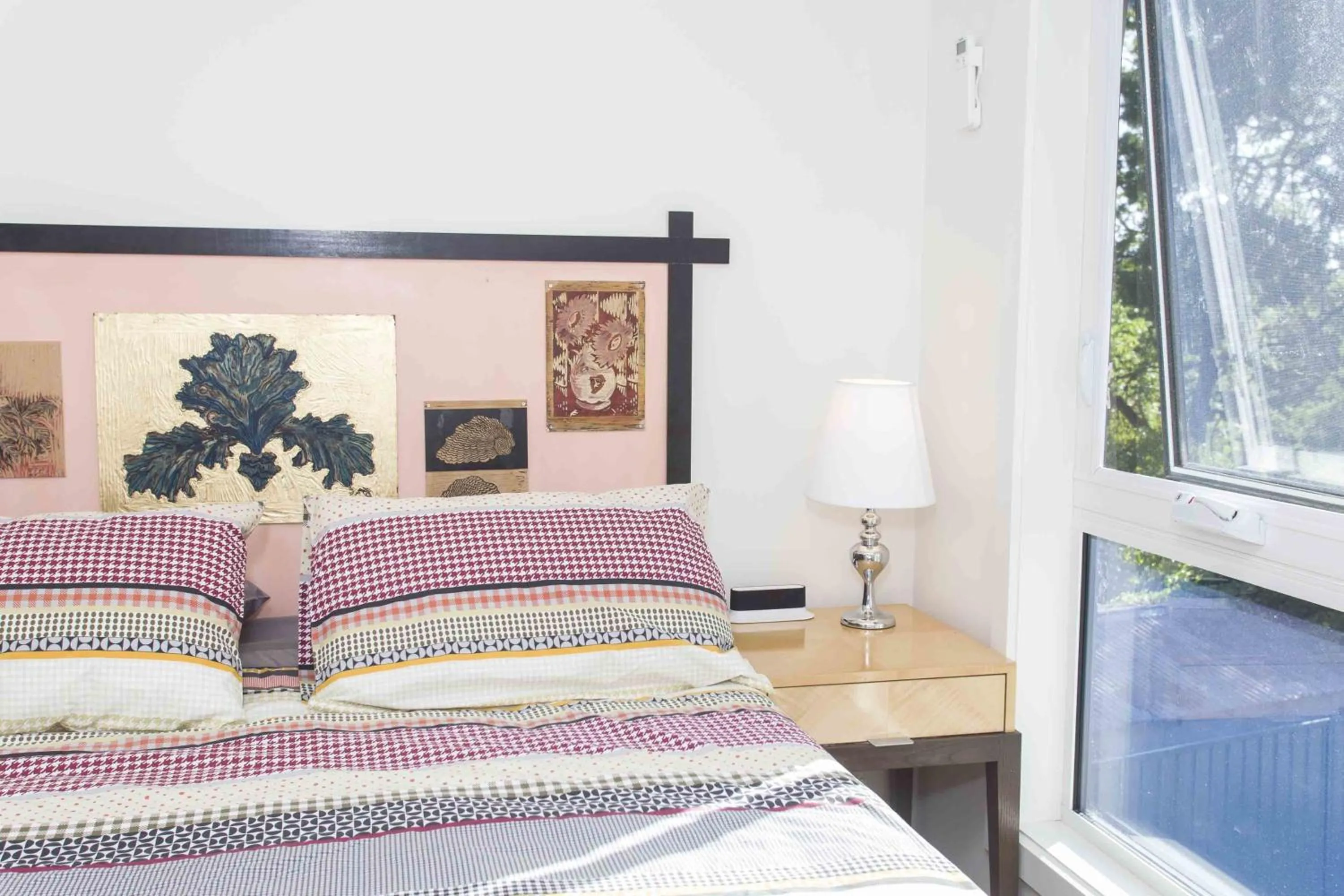 Bed in One of a Kind Apartments