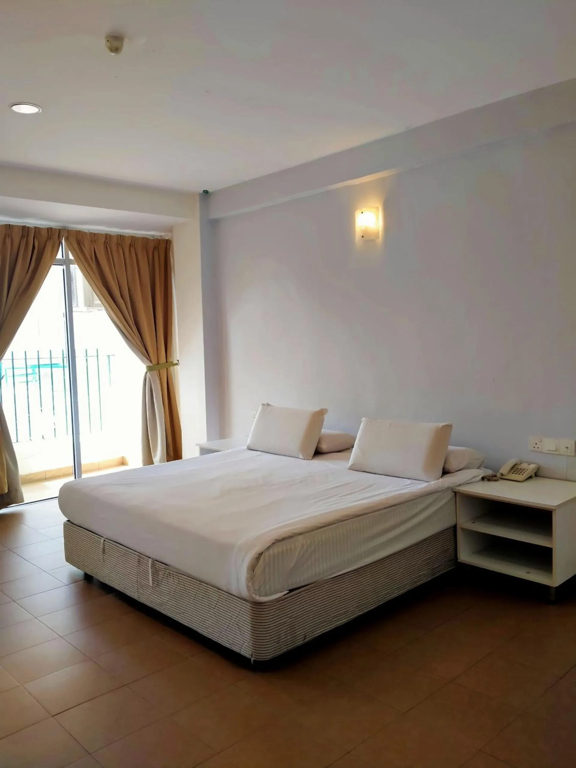 Bed in Akar Beach Resort